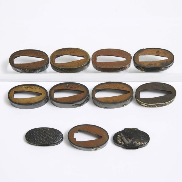 A Group of Eleven Fuchi and Kashira, Four Signed, 19th Century