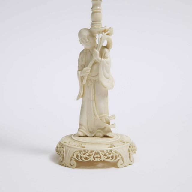 A Chinese Ivory Puzzle Ball and Stand, Early 20th Century