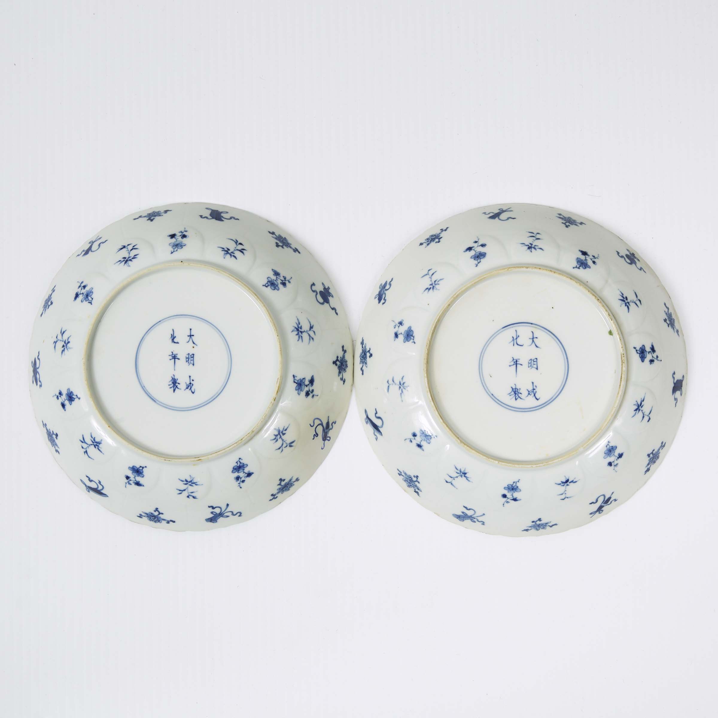 A Pair of Blue and White 'Ladies and Phoenix' Barbed Rim Dishes, Kangxi Period (1662-1722)