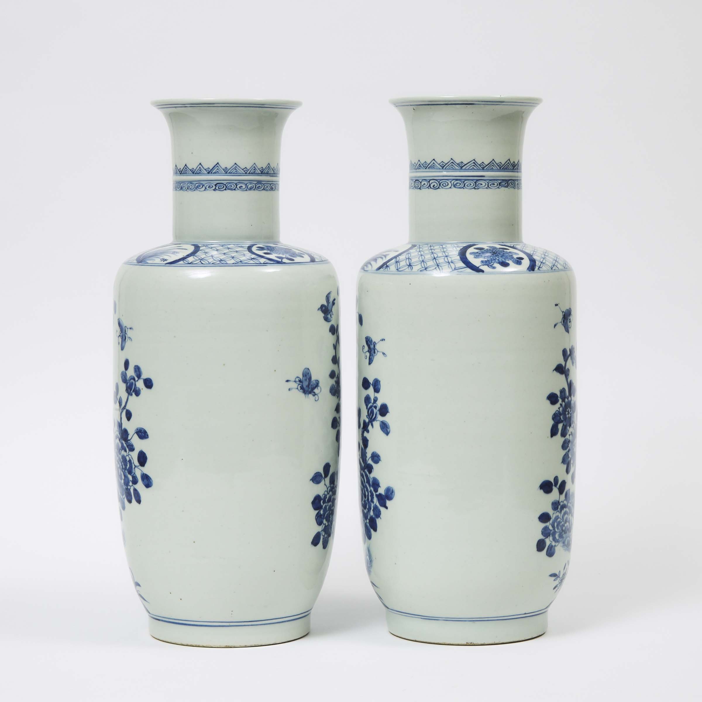 A Pair of Blue and White 'Phoenix' Rouleau Vases, Qing Dynasty