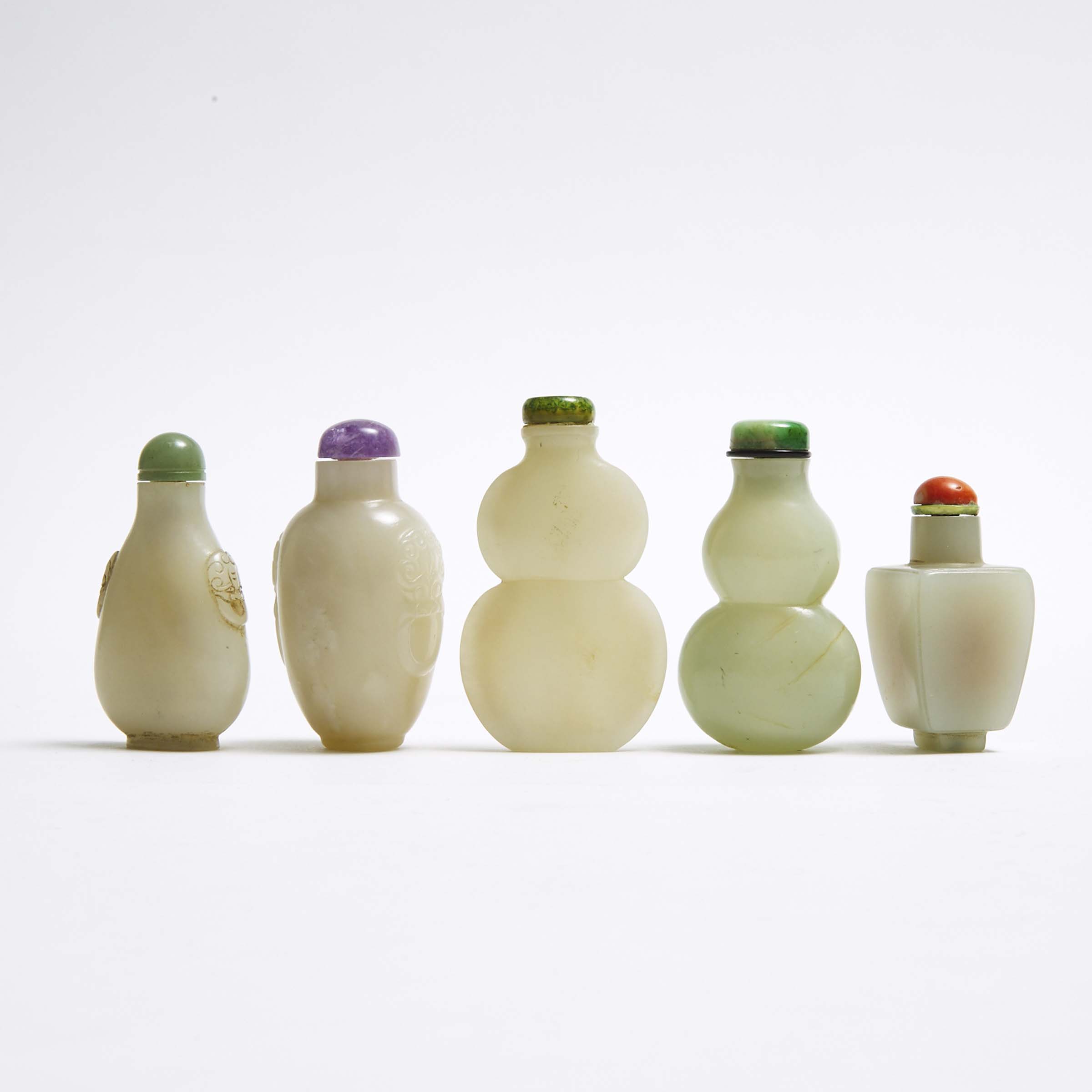 A Group of Five White Jade Snuff Bottles, Qing Dynasty