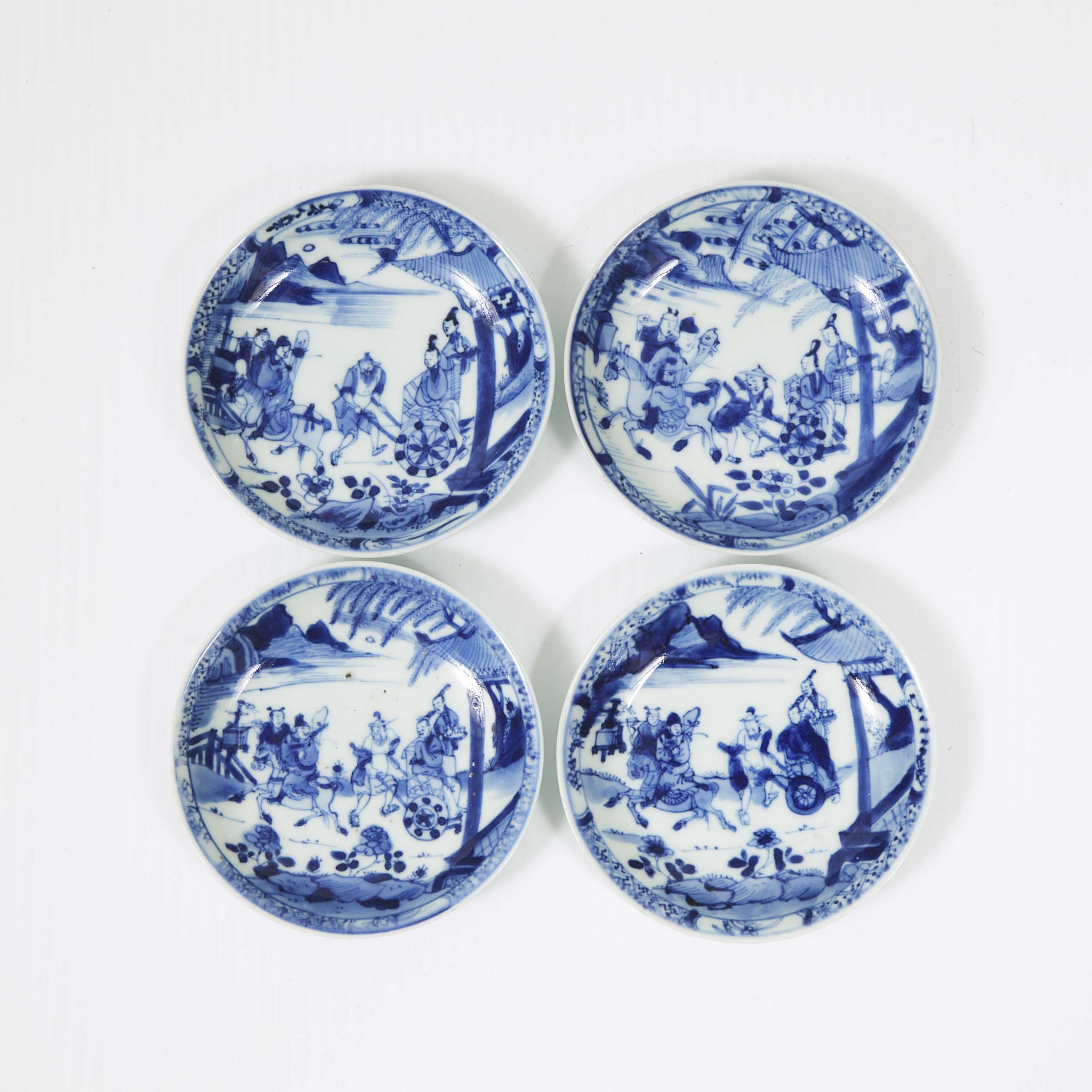 A Set of Four Blue and White Figural Saucer Dishes, Kangxi Period, 17th/18th Century