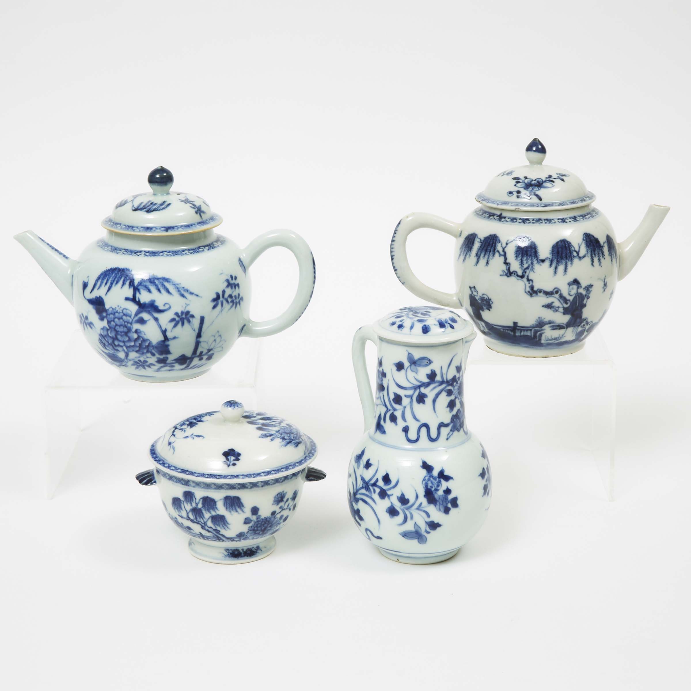 Two Chinese Export Blue and White Teapots, together with a Lidded Creamer and Sugar Bowl, 18th/19th Century