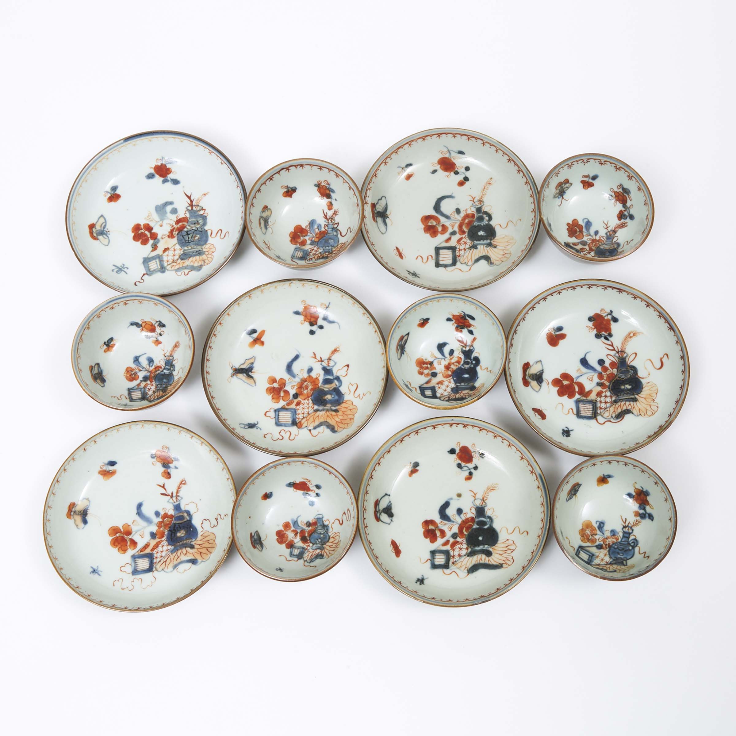 A Set of Twelve Chinese Imari Cafe-au-Lait Teacups and Saucers, 18th Century