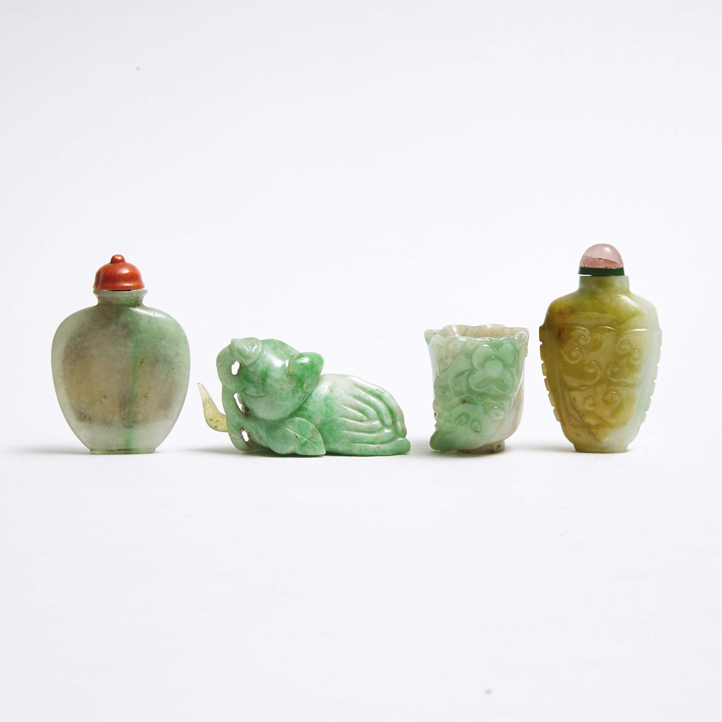 Two Jadeite Snuff Bottles, together with Two Jadeite Carvings, 19th/20th Century