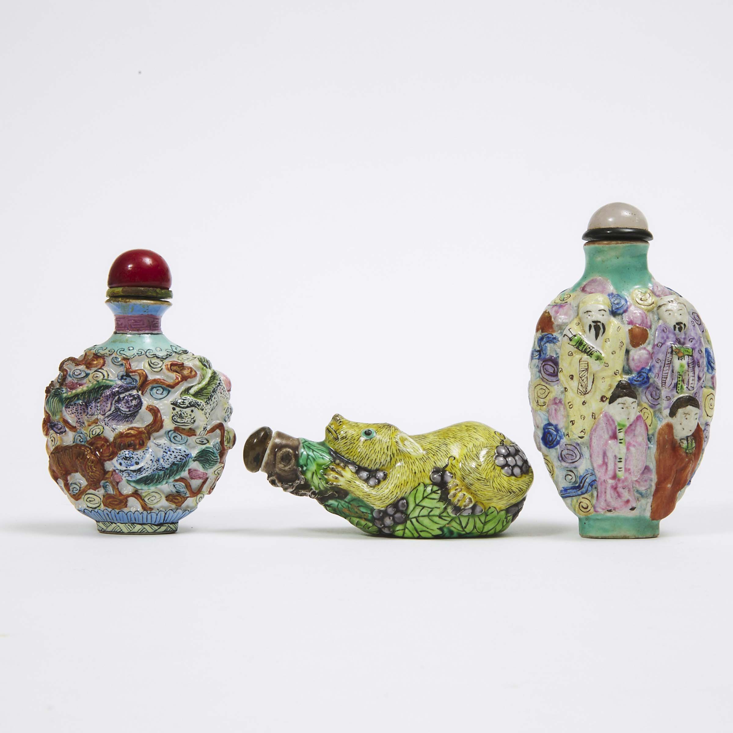 A Group of Three Famille Rose Moulded Snuff Bottles, 19th/20th Century
