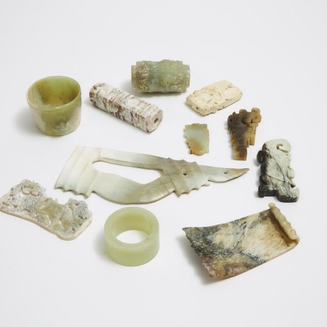 A Group of Eleven Chinese Archaic-Style Jade and Stone Carved Objects