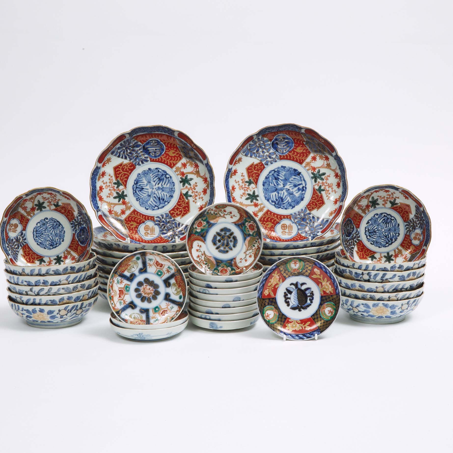 A Group of Forty-Three Imari Dishes, Meiji Period