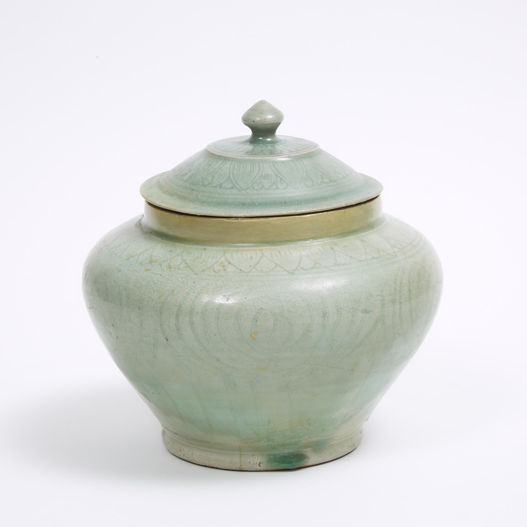 A Celadon-Glazed Jar and Cover