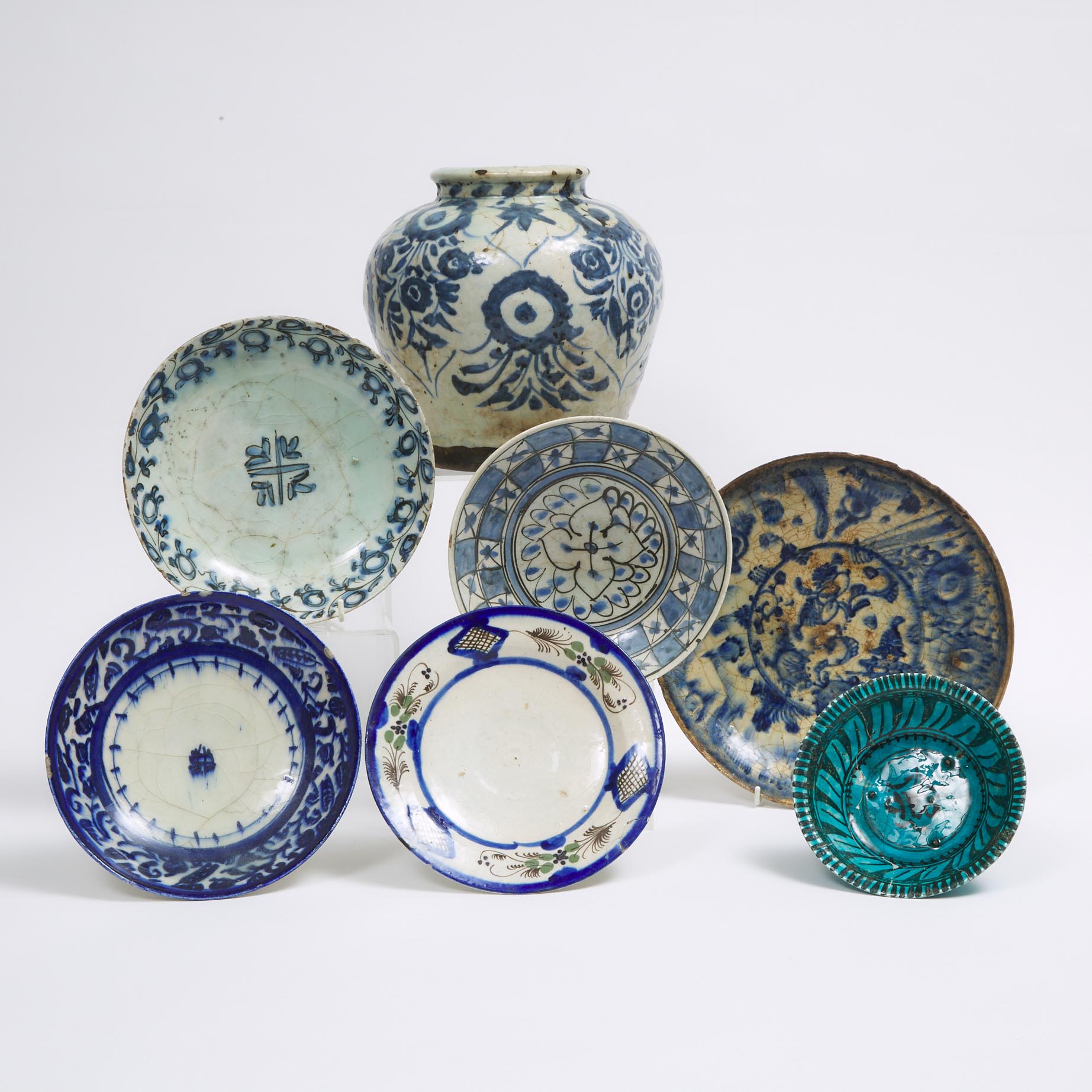 A Group of Seven Persian Ceramics, 16th Century and Later