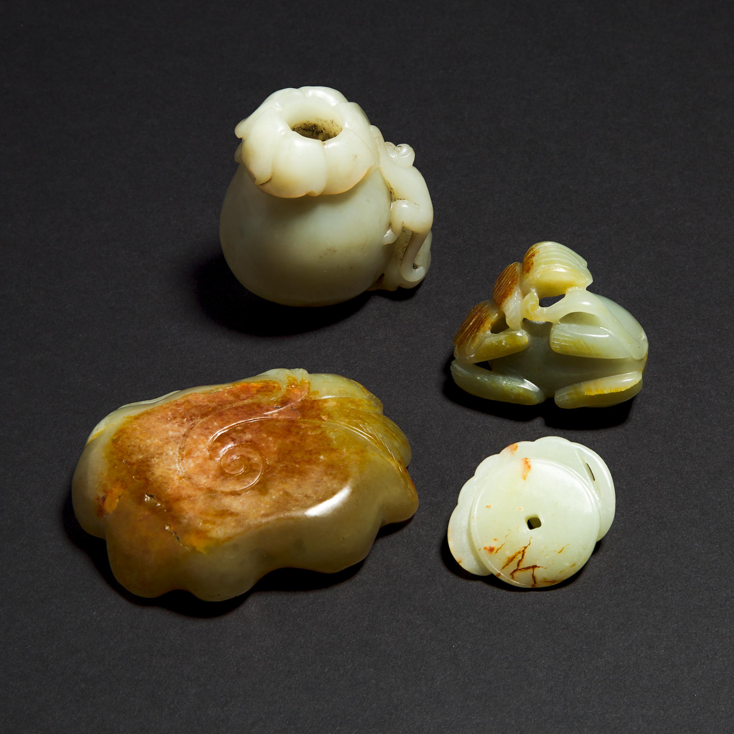 A Group of Four Celadon Jade Carvings