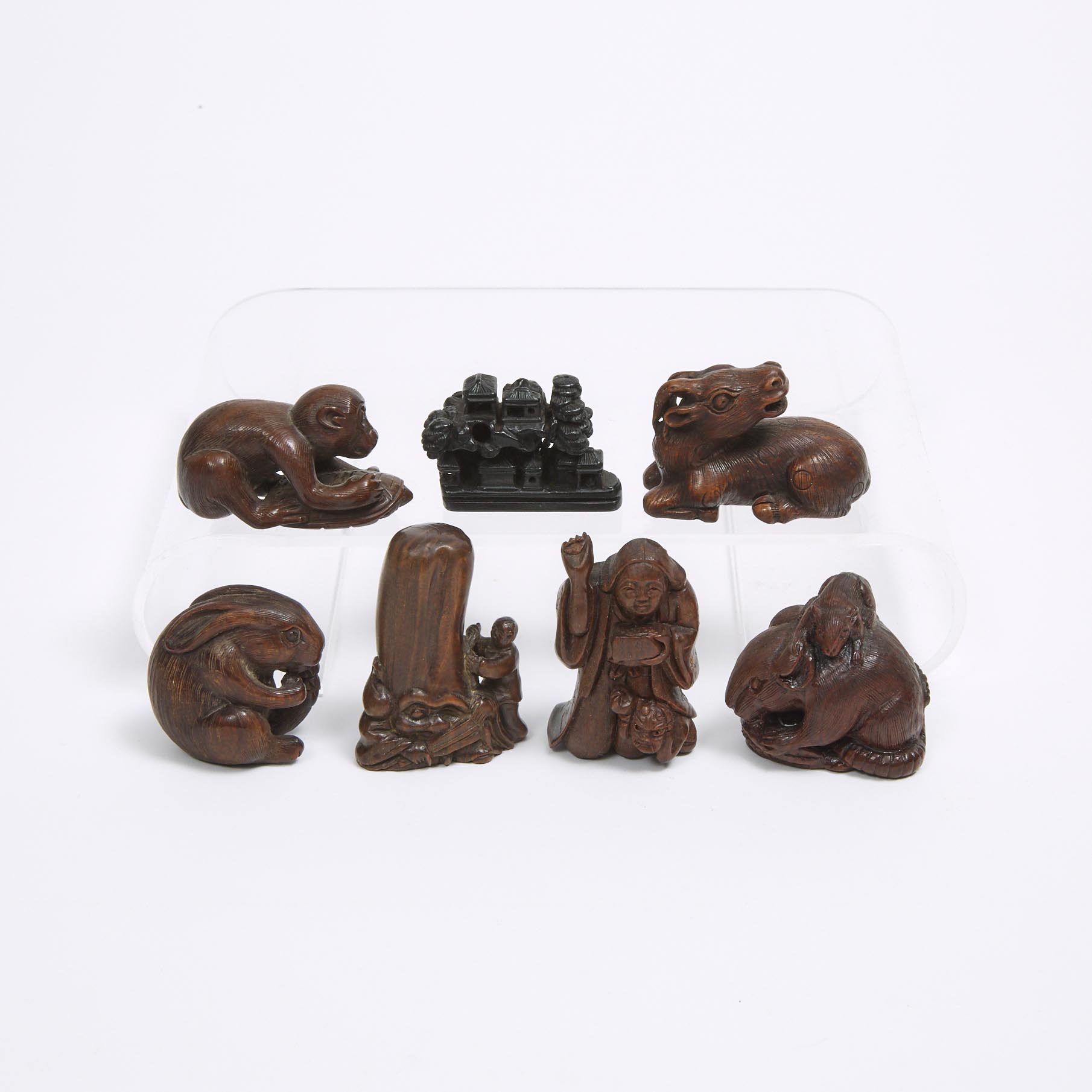 A Group of Seven Wood Netsuke, Meiji Period and Later