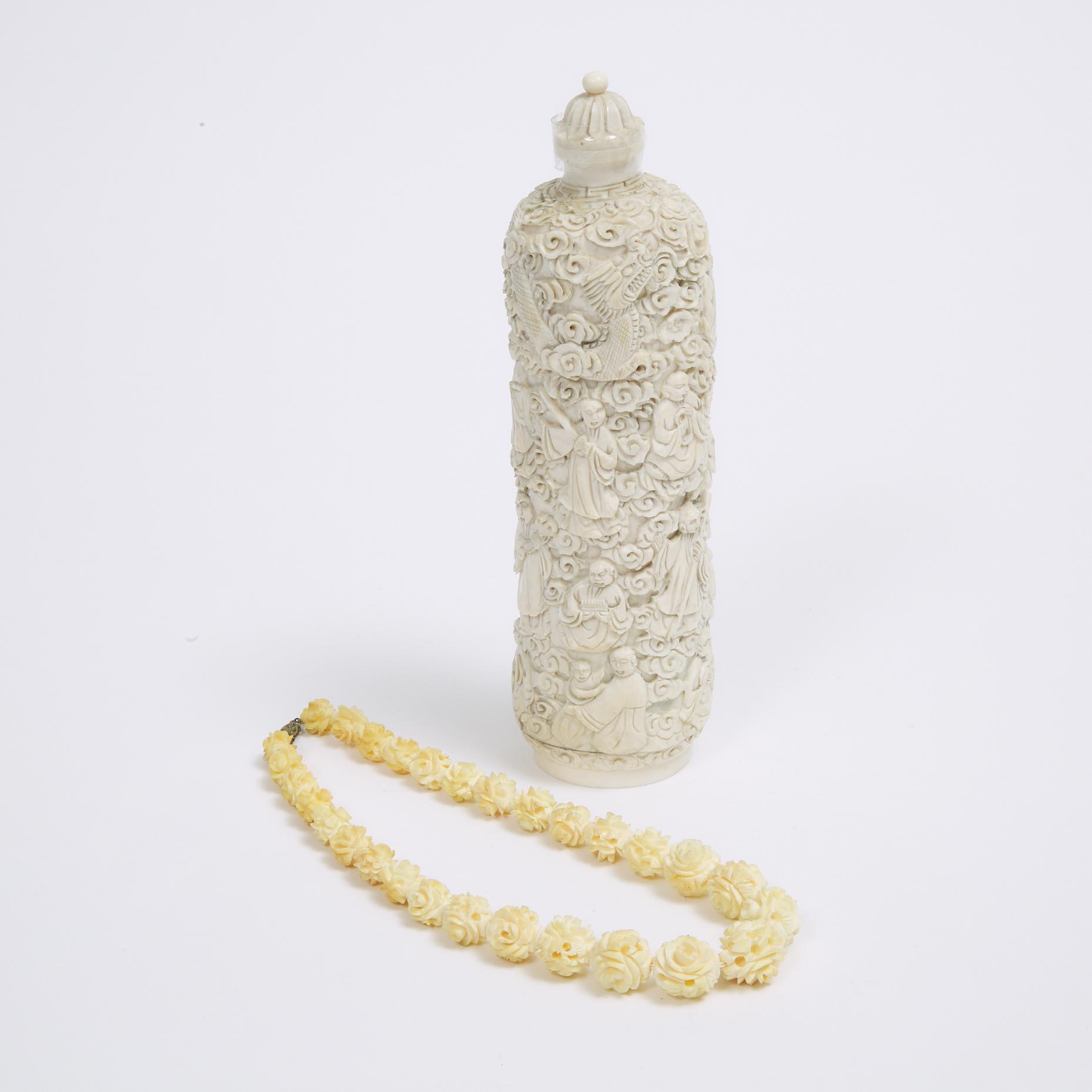 A Large Ivory Snuff Bottle, together with an Ivory Bead Necklace