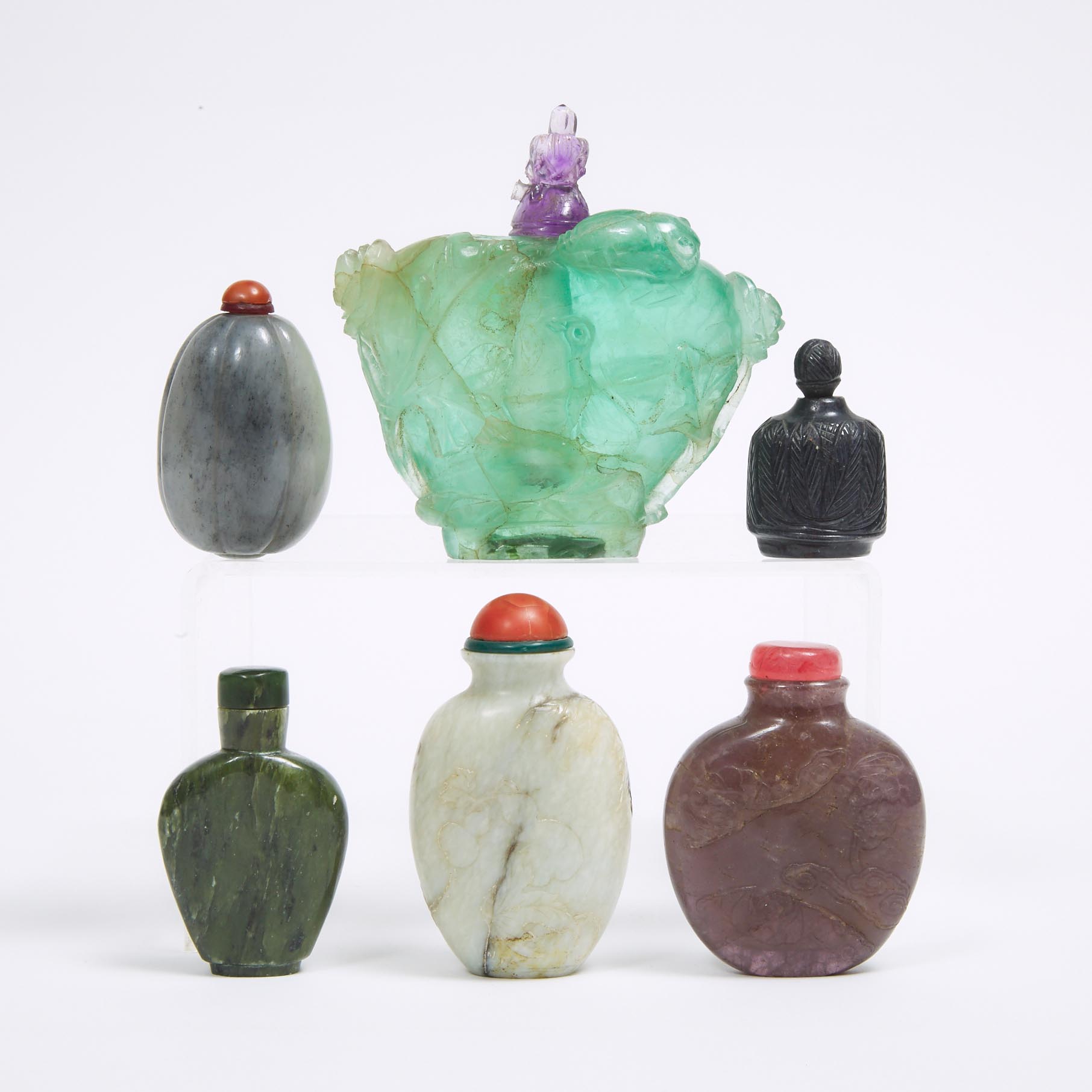A Group of Six Hardstone Snuff Bottles
