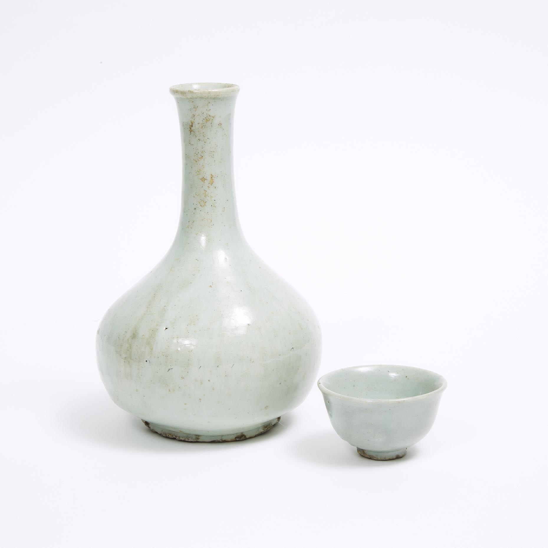 A White Glazed Porcelain Bottle Vase, together with a Cup, Korea, Joseon Dynasty, 19th Century or Earlier