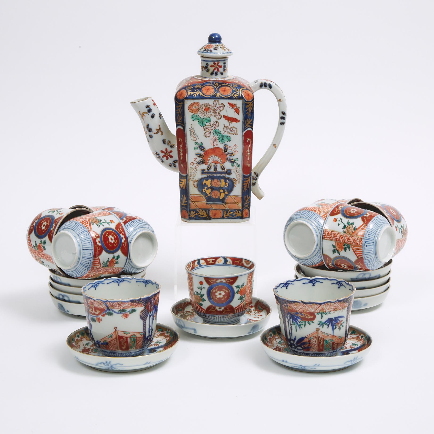 A Group of Twenty-Three Imari Dishes, Cups, and Teapot, Edo/Meiji Period
