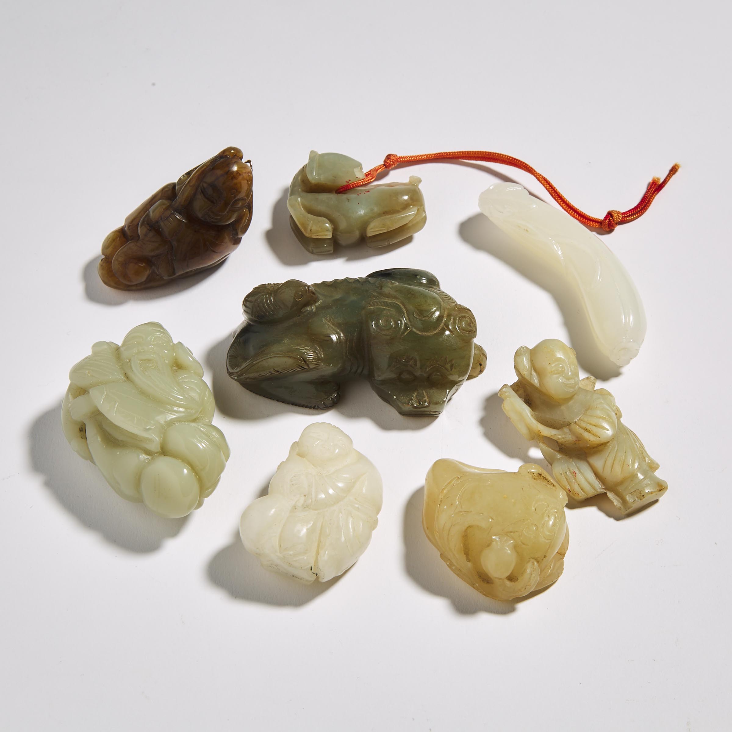A Group of Eight Jade and Hardstone Carvings, 20th Century