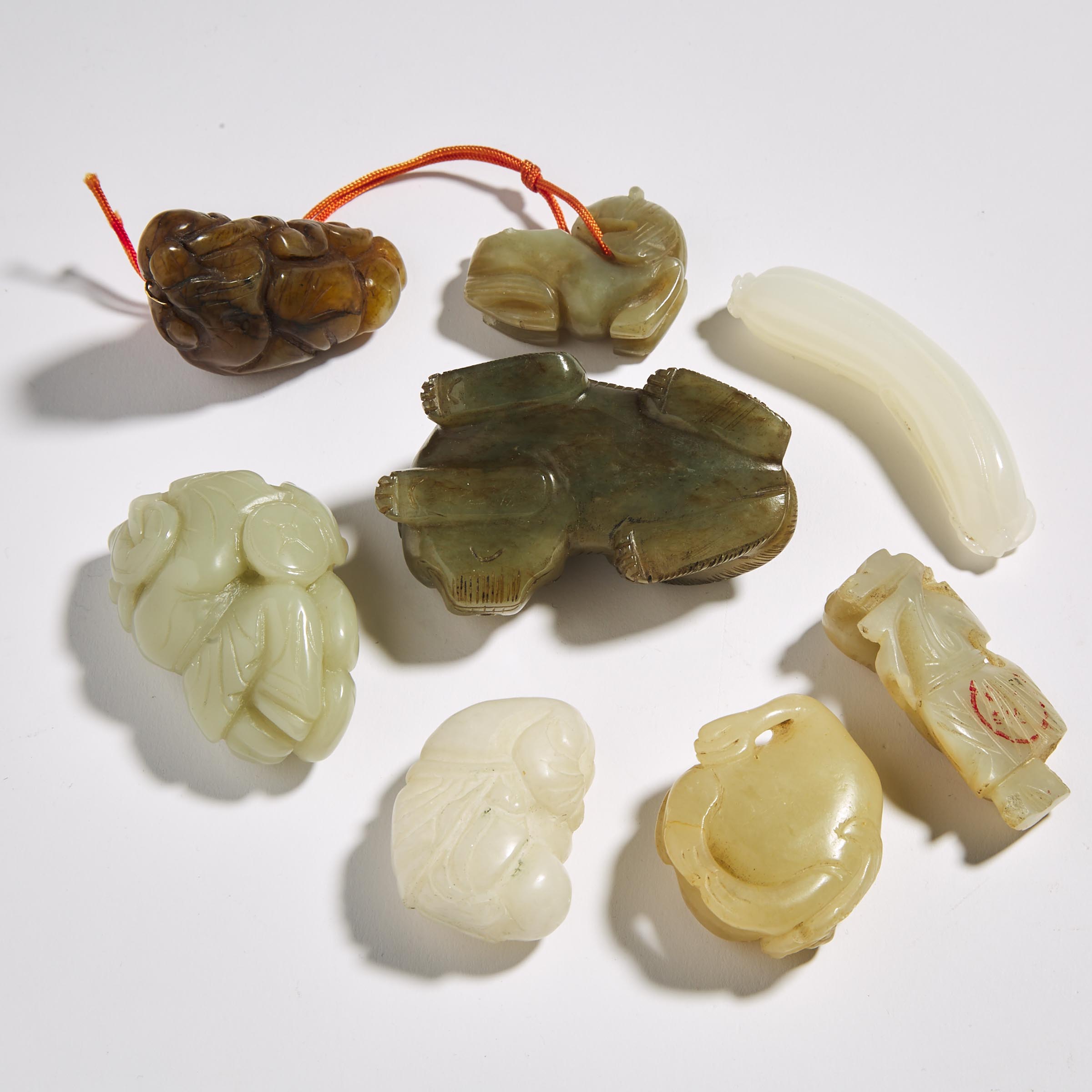 A Group of Eight Jade and Hardstone Carvings, 20th Century
