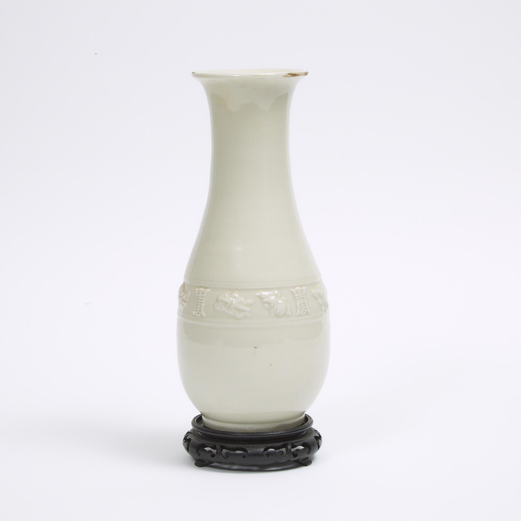 A White-Glazed Moulded 'Shou' Vase, 19th Century or Later