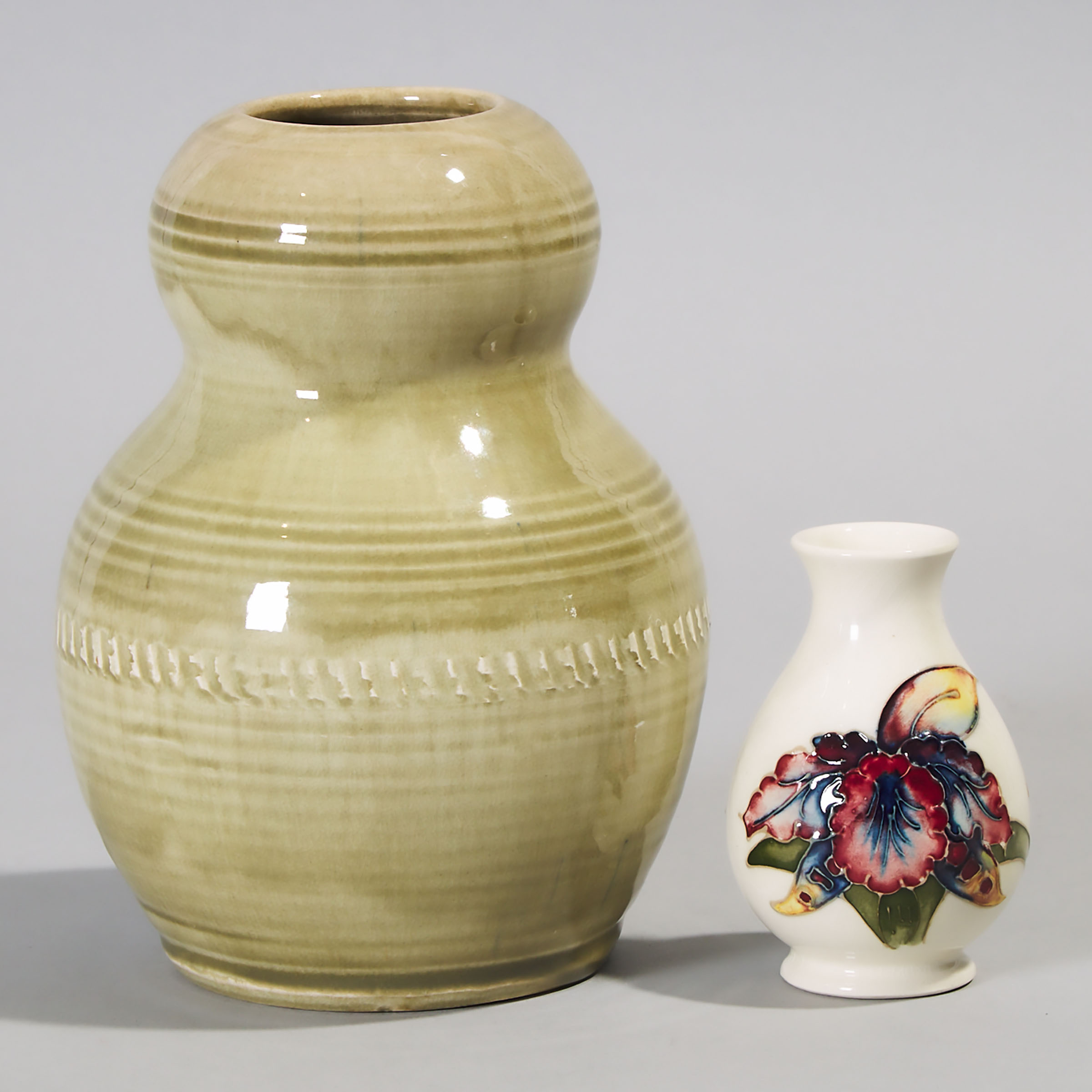 Moorcroft Small Orchids Vase and a Natural Pottery Vase, 20th century