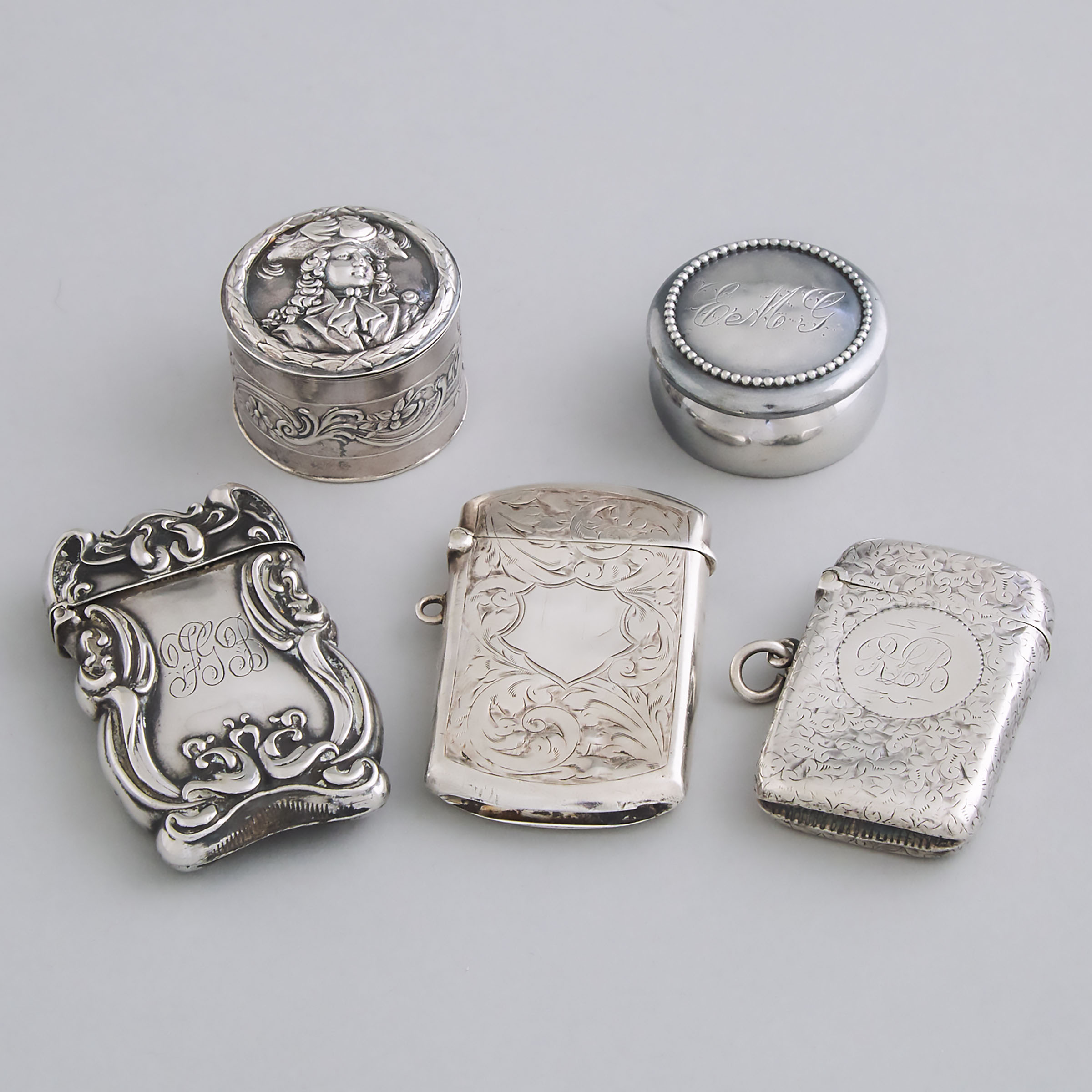 Five North American, English and German Silver Vesta Cases and Circular Boxes, late 19th/early 20th century