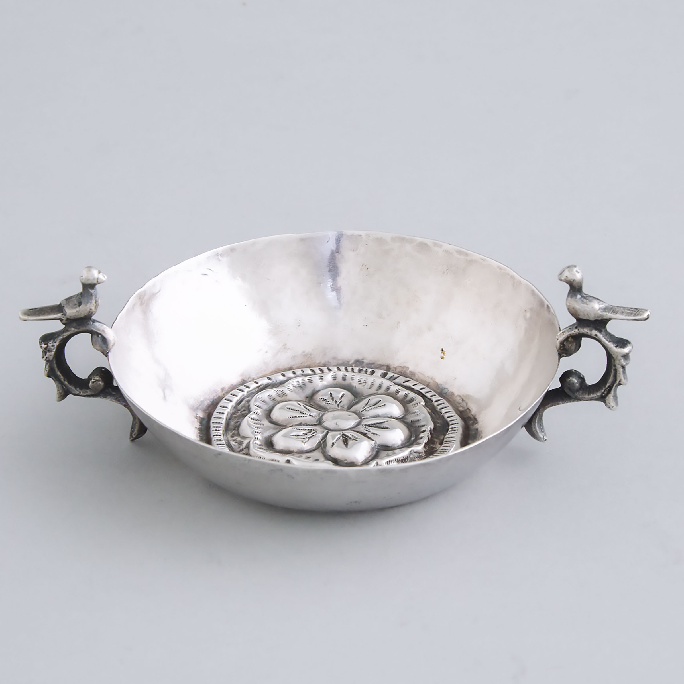 Spanish Colonial Silver Two-Handled Shallow Circular Dish, 19th century