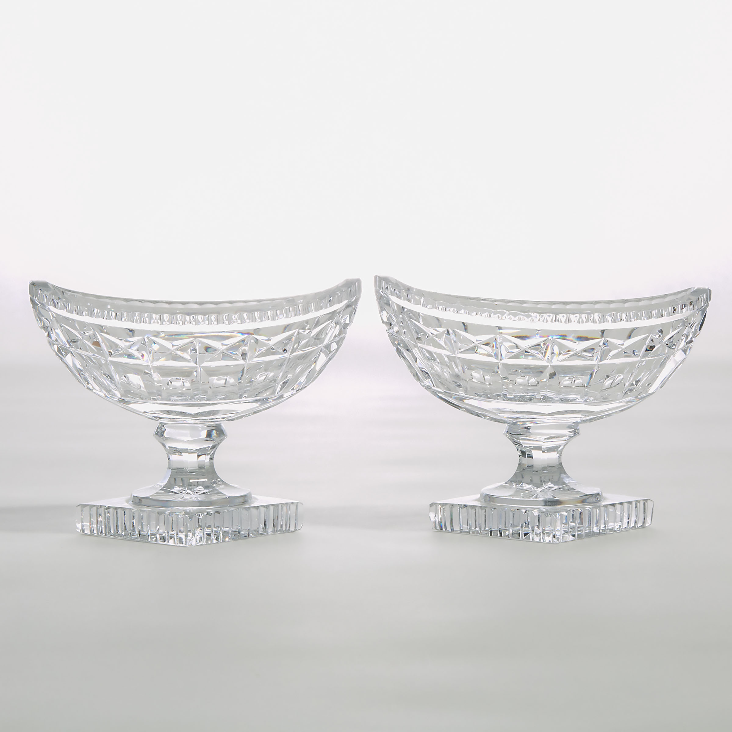 Pair of Anglo-Irish Style Cut Glass Small Pedestal-Footed Oval Bowls, 20th century