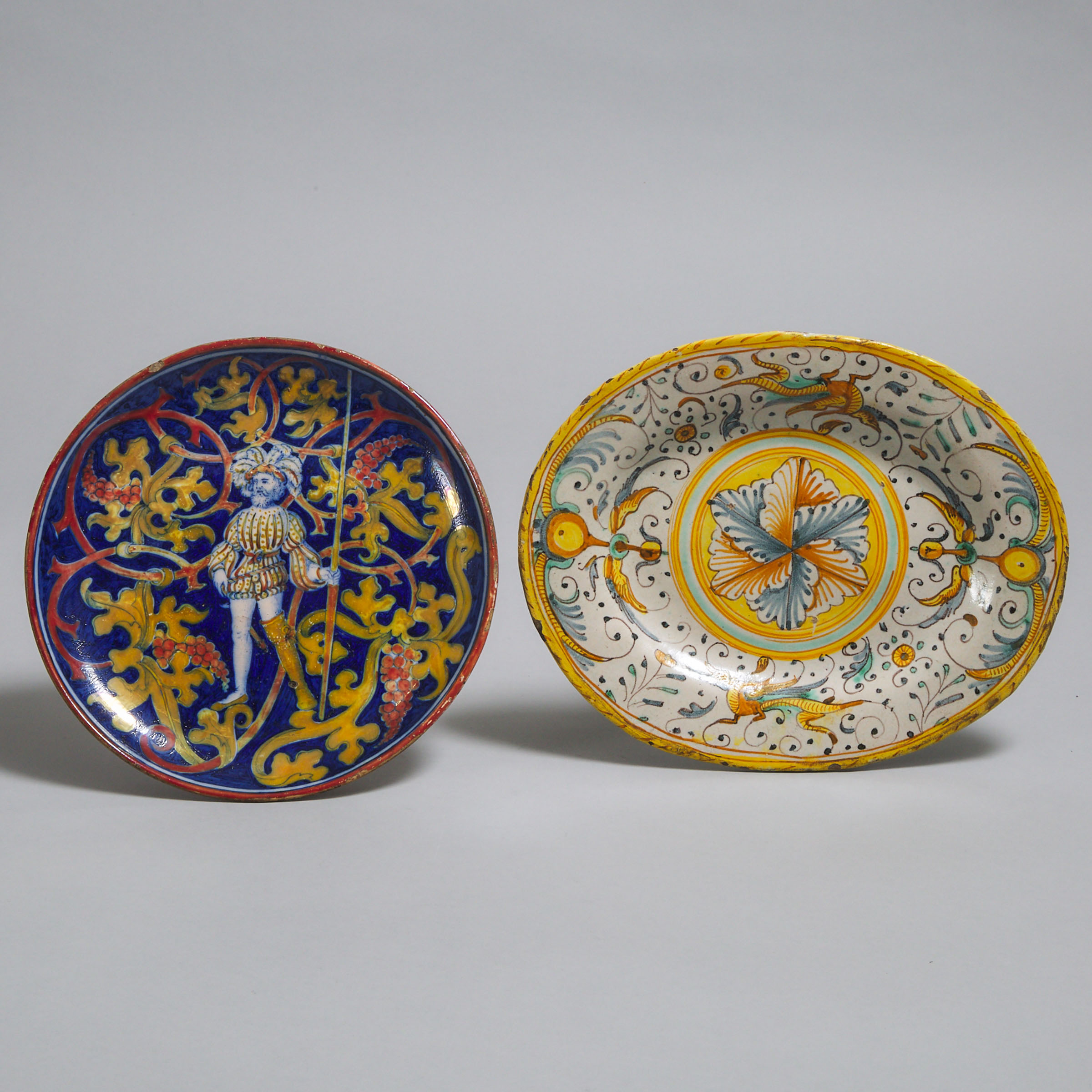 Italian Lustre Decorated Maiolica Plate and an Oval Dish, late 19th/early 20th century