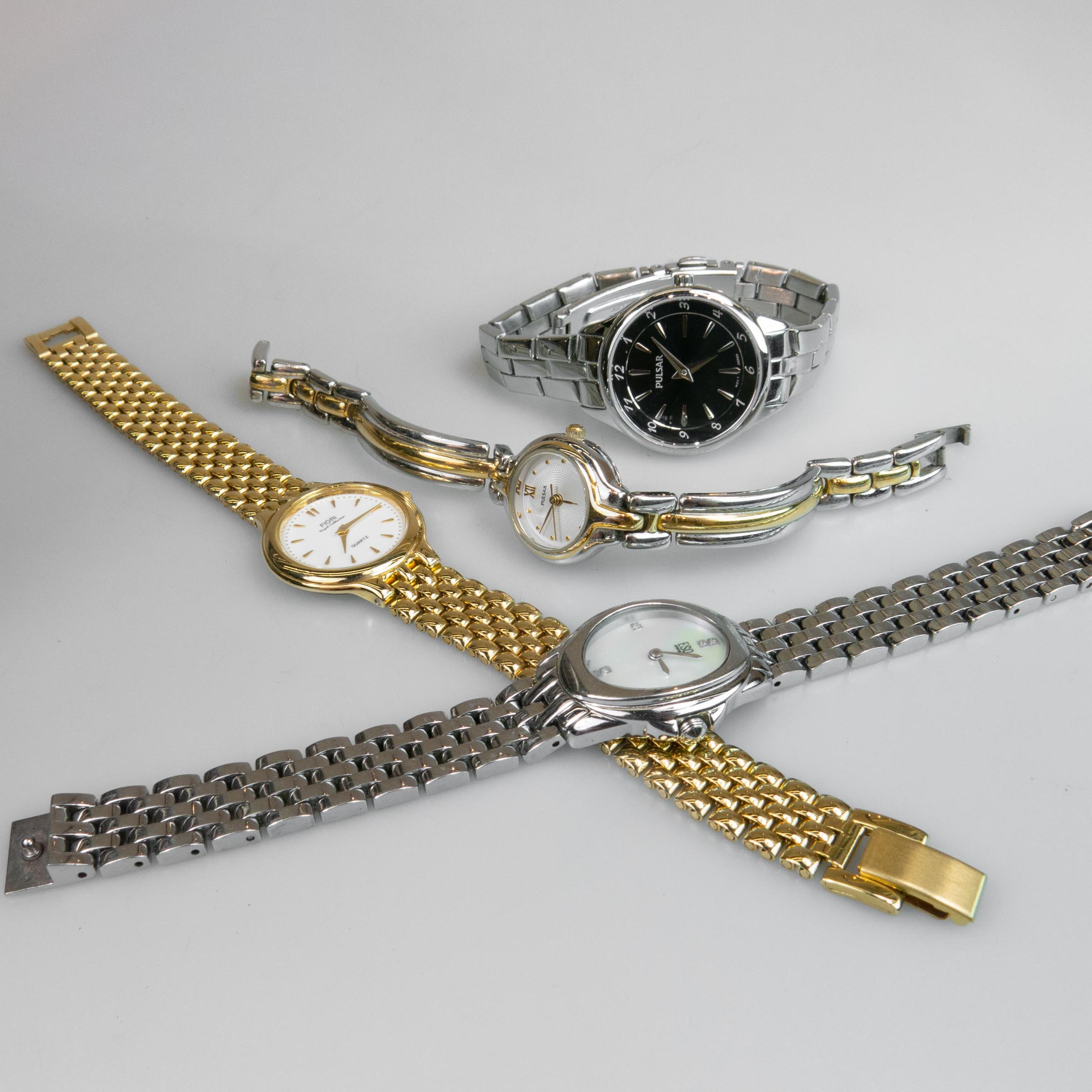 Four Various Quartz Wristwatches