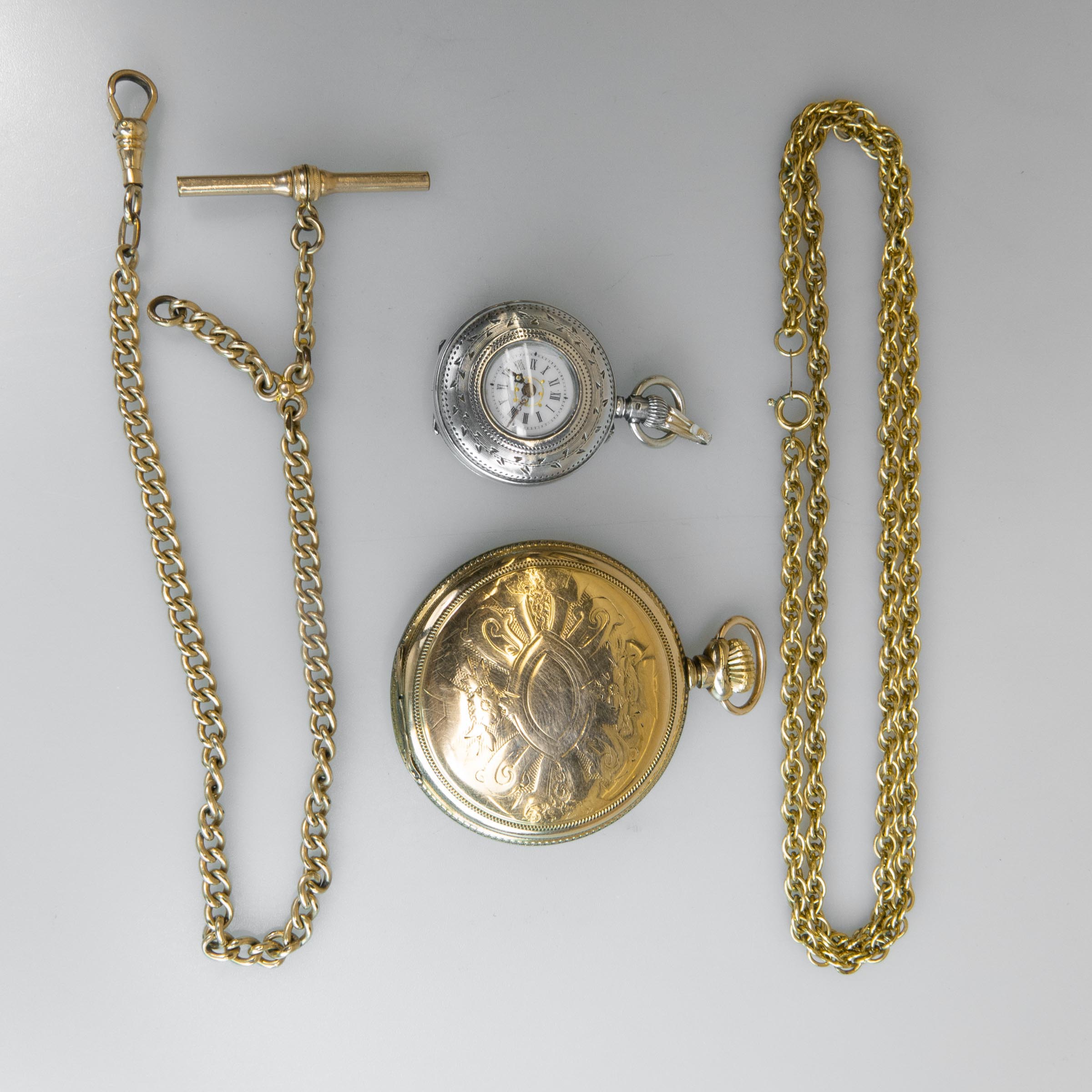 Two Pocket Watches And Chains