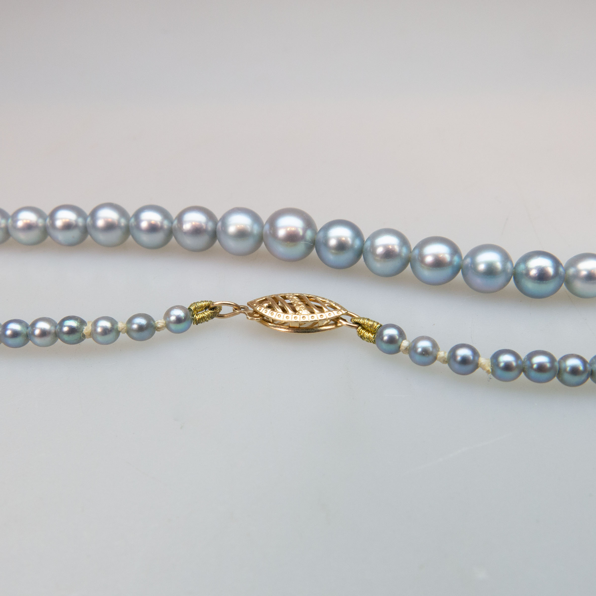 Single Graduated Strand Of Cultured Grey Pearls