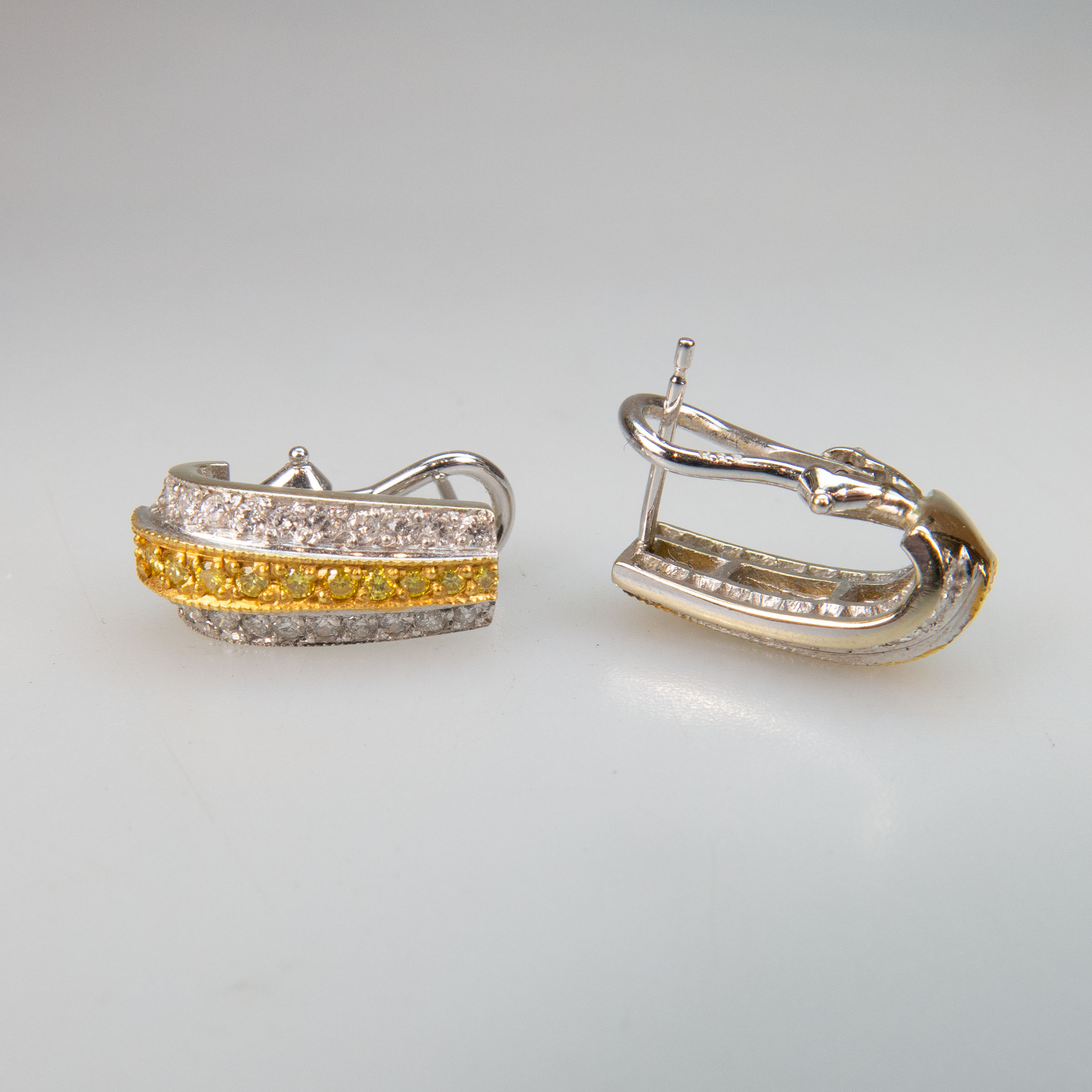 Pair Of 18k White And Yellow Gold Earrings
