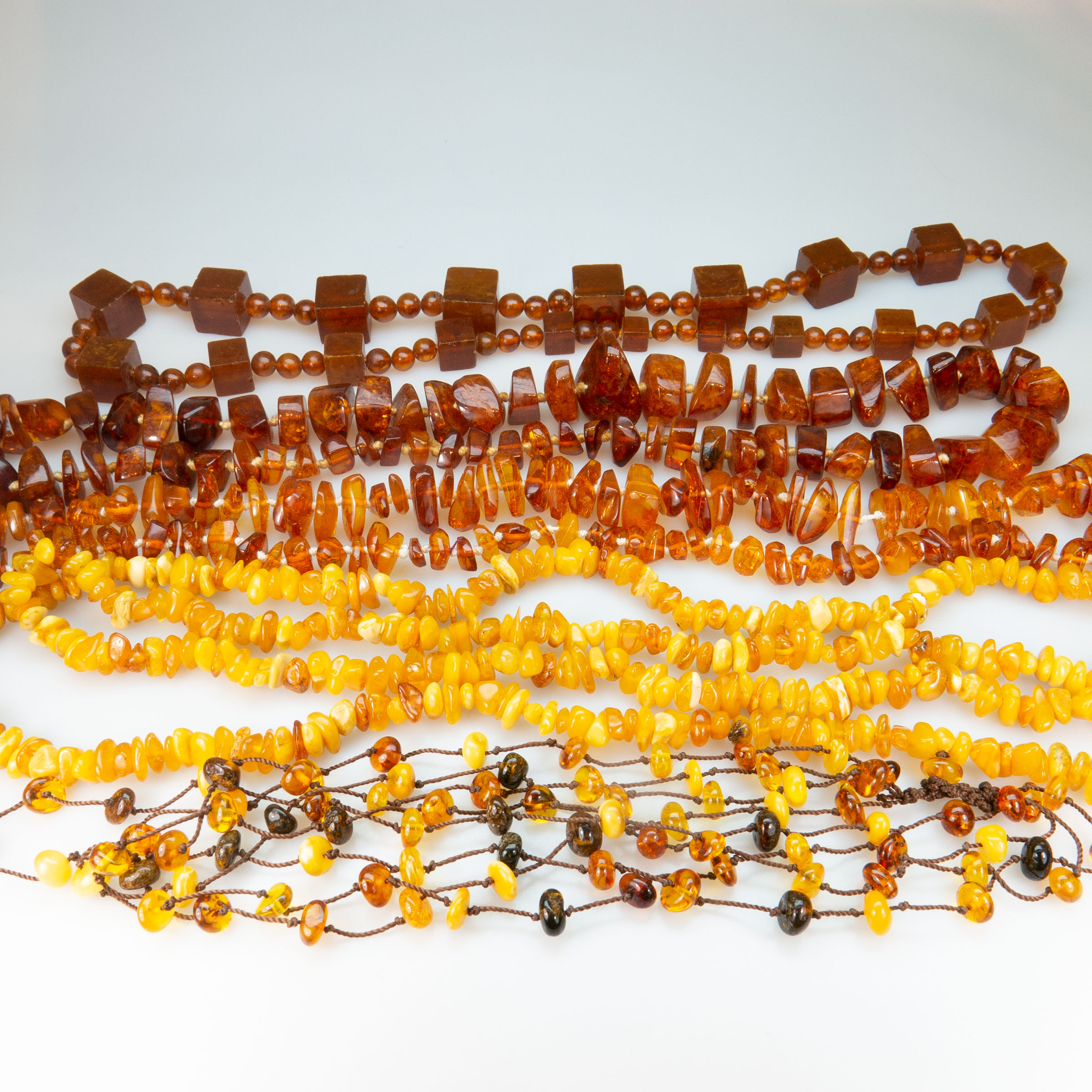 5 Various Strands Of Amber Beads
