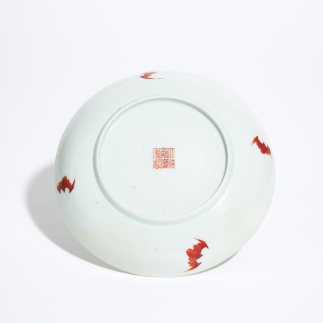 An Unusual Iron-Red Decorated 'Foreigners' Dish, Jiaqing Mark, 18th Century or Later
