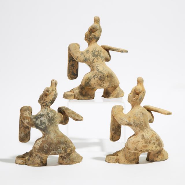A Group of Three Pottery Figures of Dancers, Han Dynasty (206 BC - AD 220)