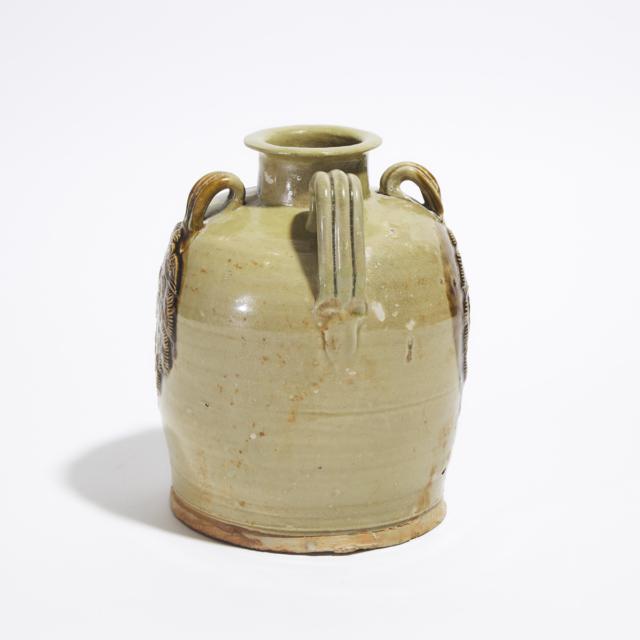 A Rare Changsha Amber and Straw-Glazed Pottery Ewer with 'Warrior' Design, Tang Dynasty (AD 618-907)