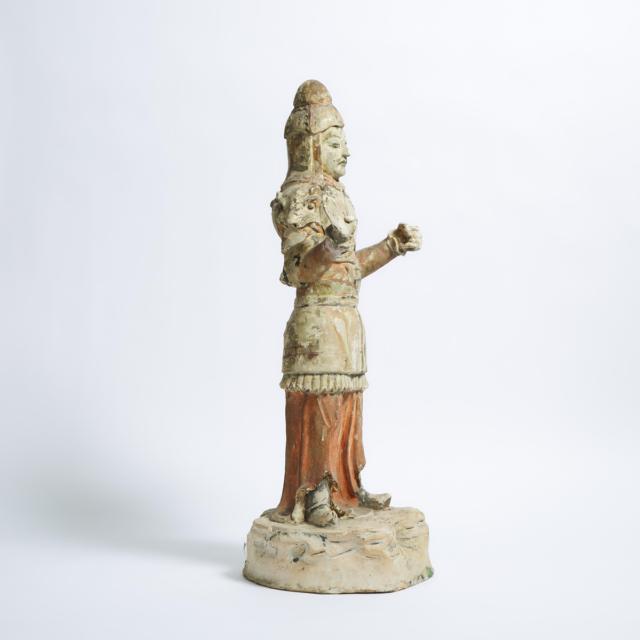 A Large Painted Pottery Figure of a Guardian, Tang Dynasty (AD 618-907)