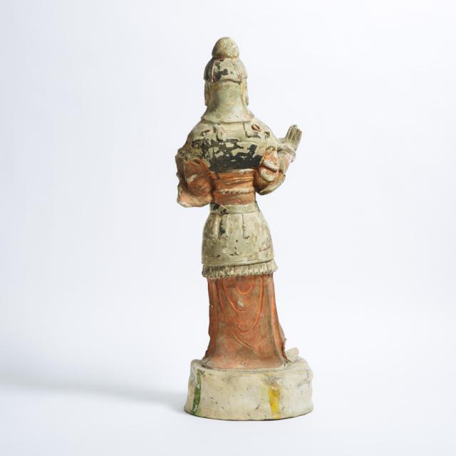 A Large Painted Pottery Figure of a Guardian, Tang Dynasty (AD 618-907)