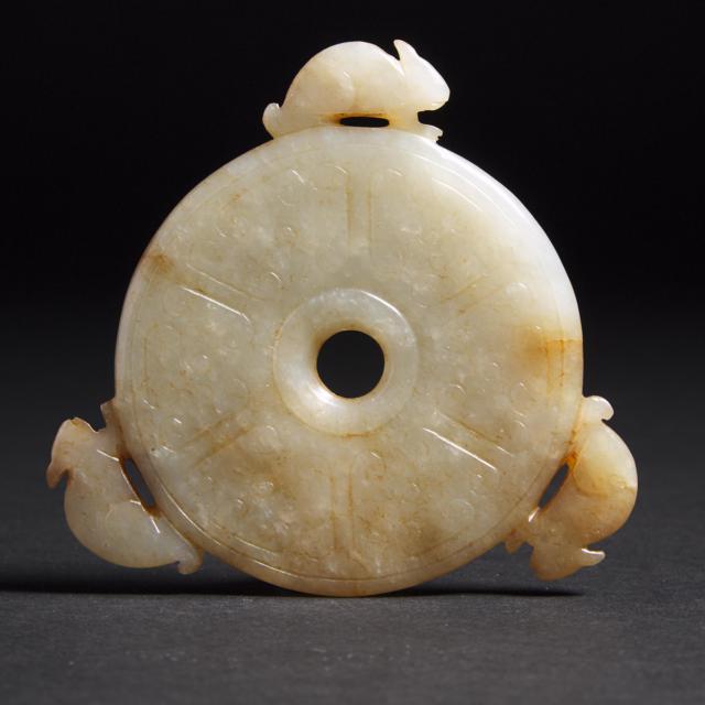 A White and Russet Jade 'Rat' Bi Disc, Ming Dynasty  