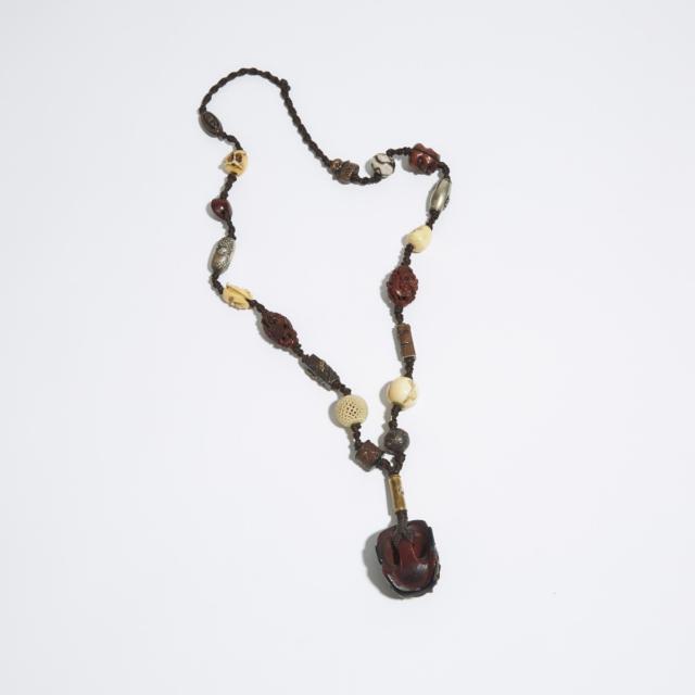 A Netsuke and Ojime Beaded Necklace, 19th Century