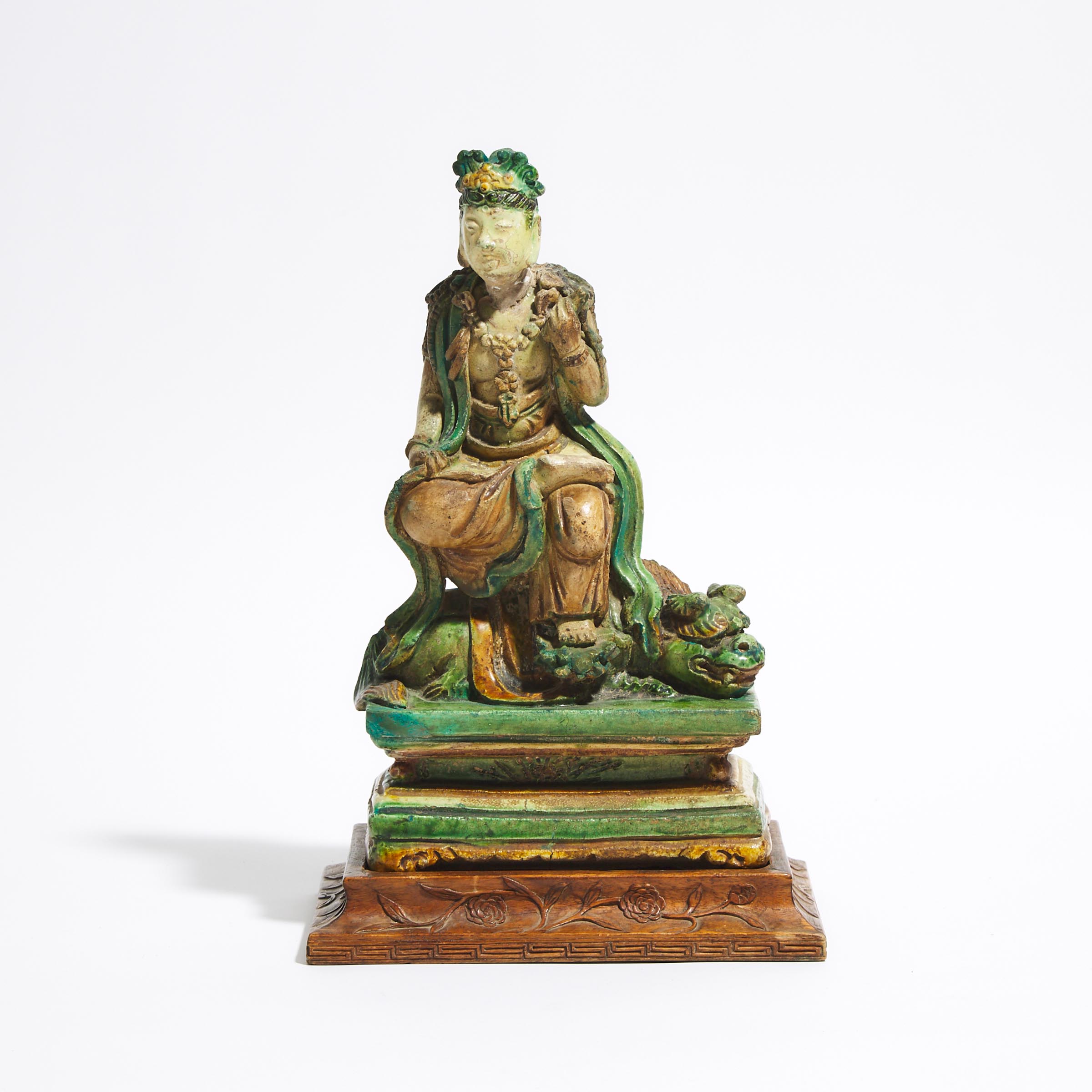 A Sancai-Glazed Seated Figure of Manjushri, Yuan/Ming Dynasty