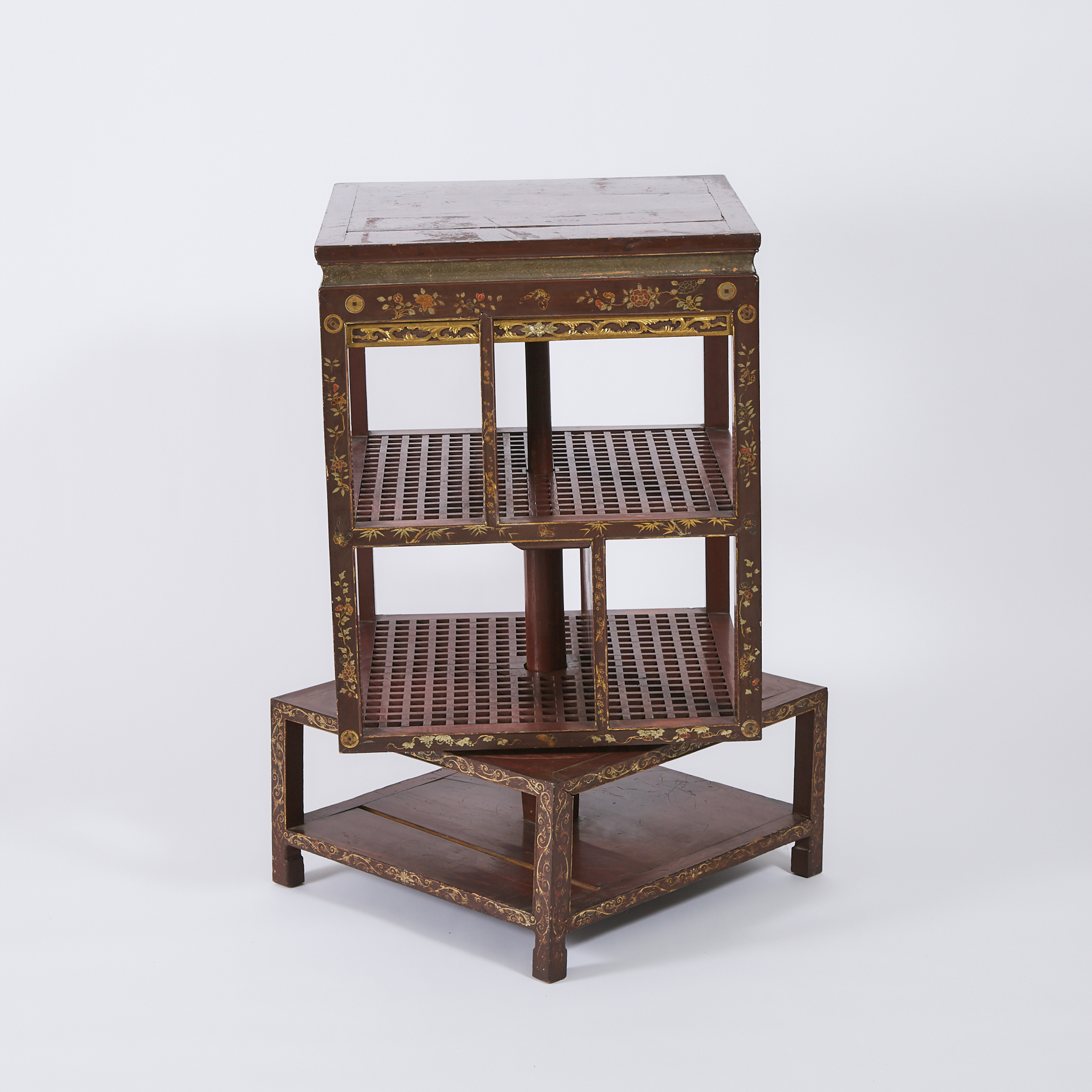 A Chinoiserie Red and Gilt Painted Revolving Bookcase, Circa 1900