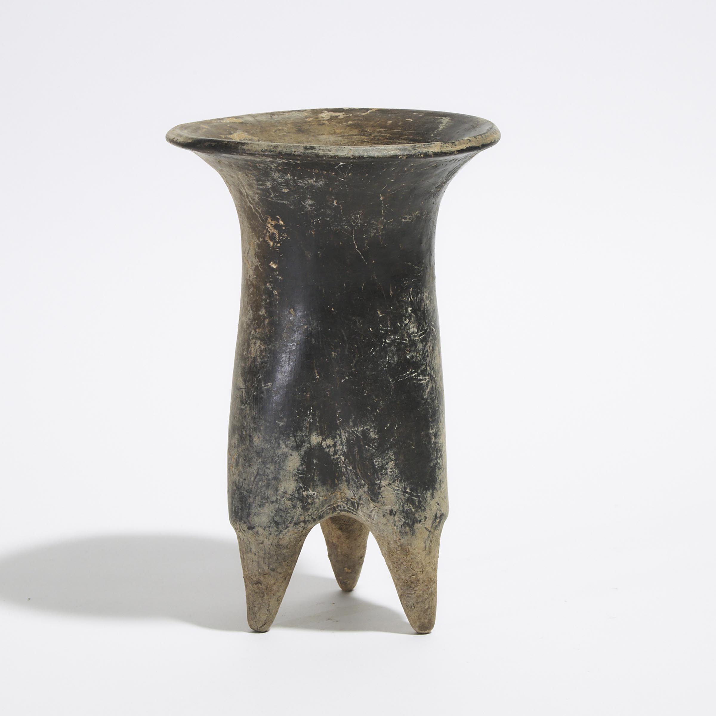 A Neolithic Black Pottery Tripod Vessel, 'Li', Inner Mongolia, Xiajiadian Culture, Circa 1500 BC