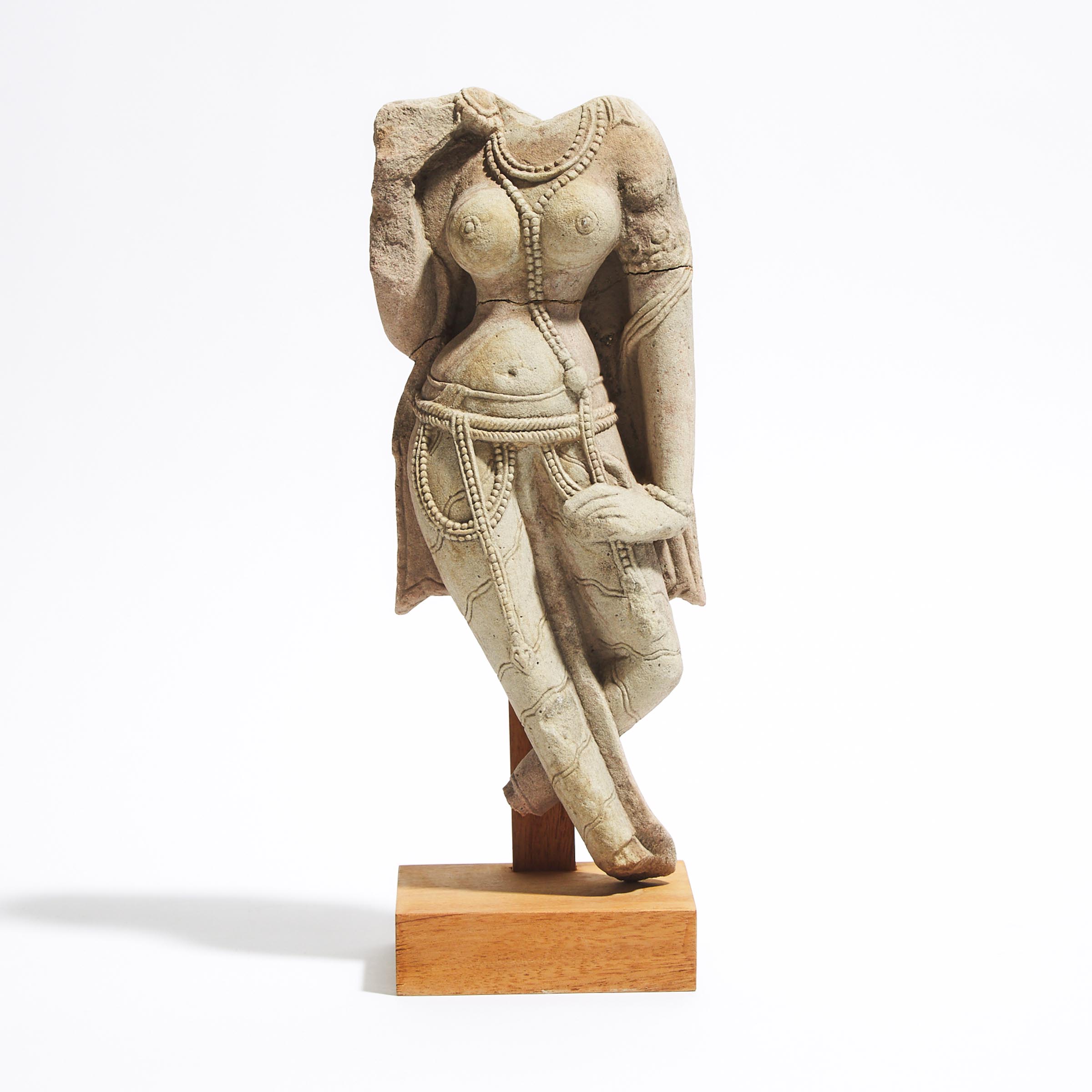 A Limestone Torso of a Goddess, India, 12th Century or Later