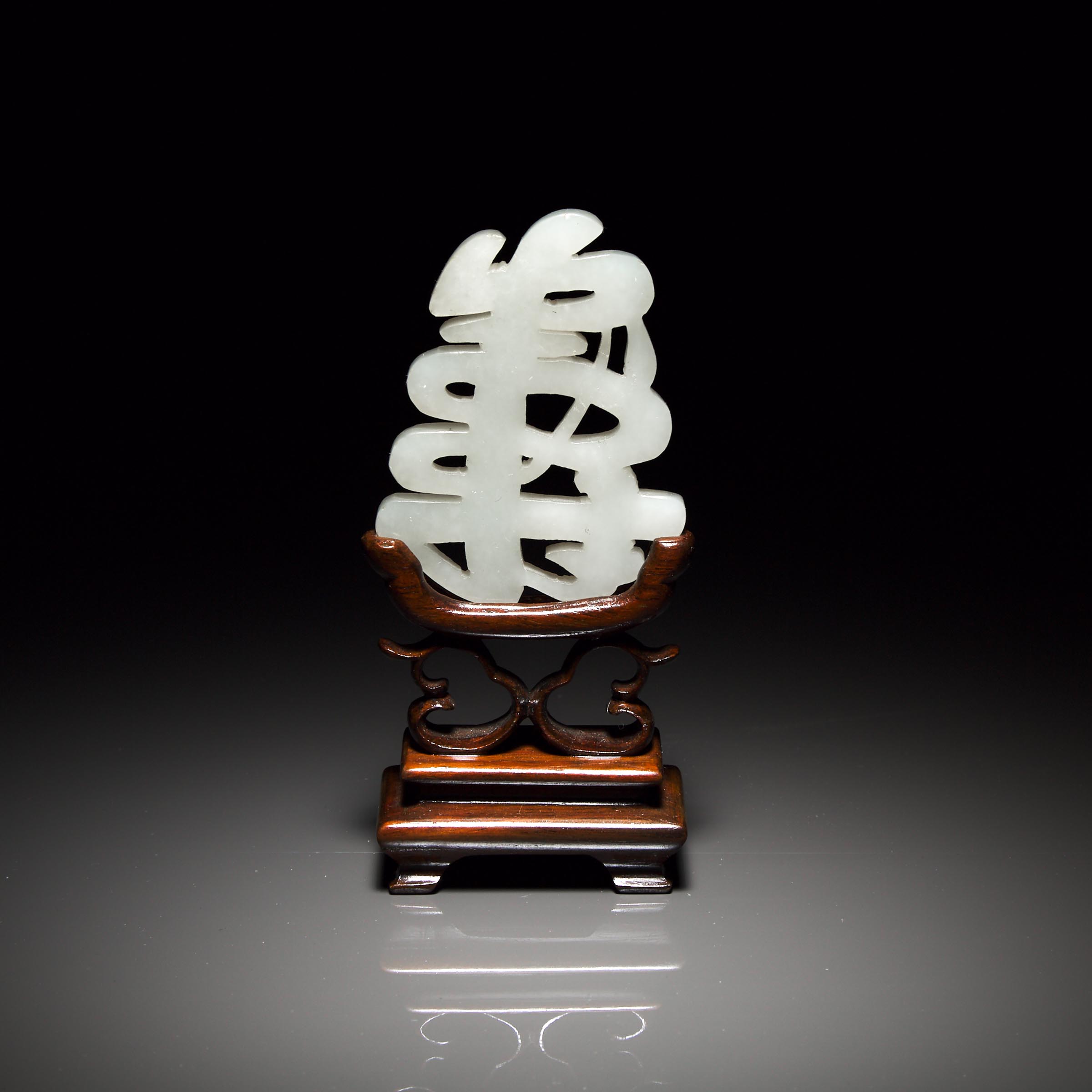 A White Jade 'Shou' Character, 19th Century