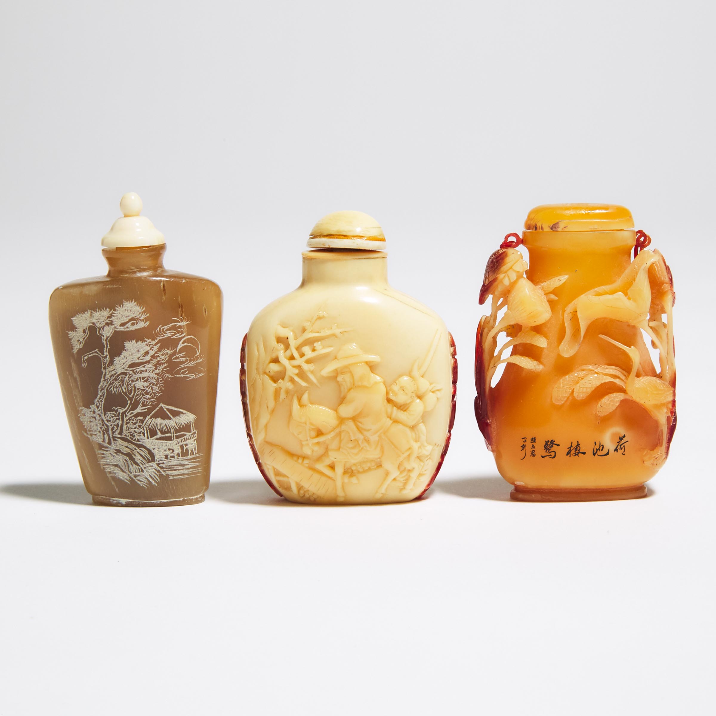 A Group of Three Carved Hornbill and Buffalo Horn Snuff Bottles, Mid 20th Century