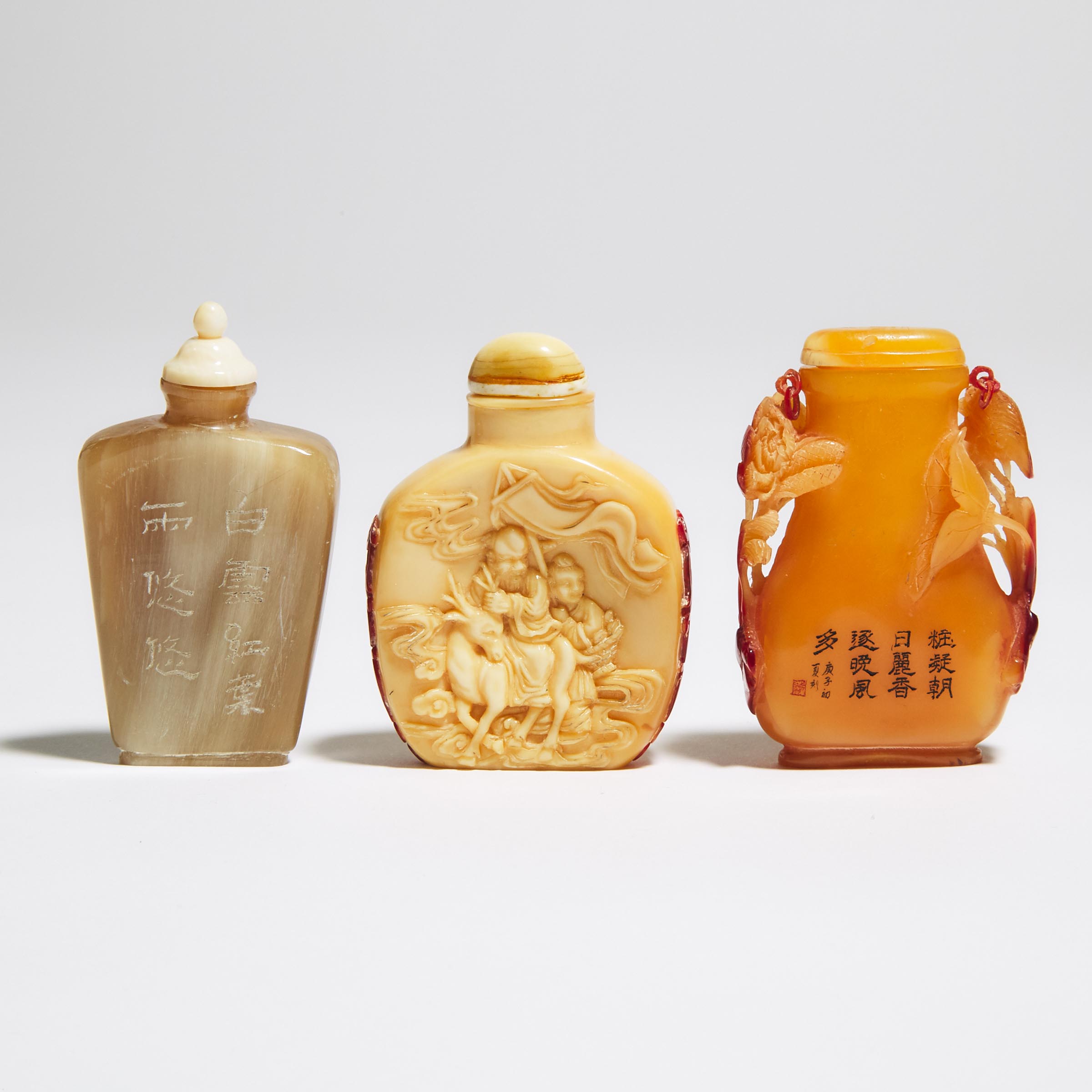 A Group of Three Carved Hornbill and Buffalo Horn Snuff Bottles, Mid 20th Century