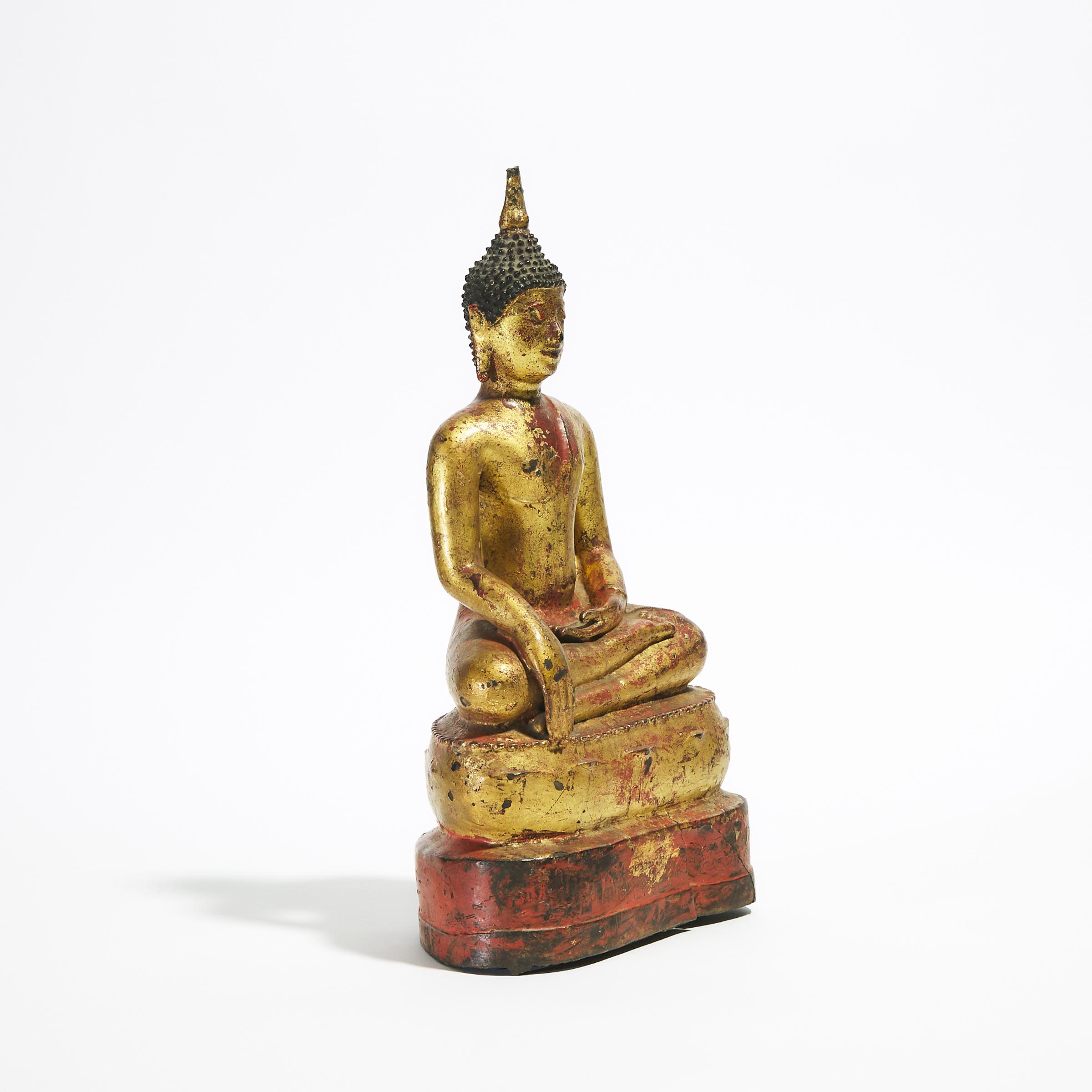 A Red and Gilt Lacquered Figure of a Seated Buddha, Thailand, 19th Century