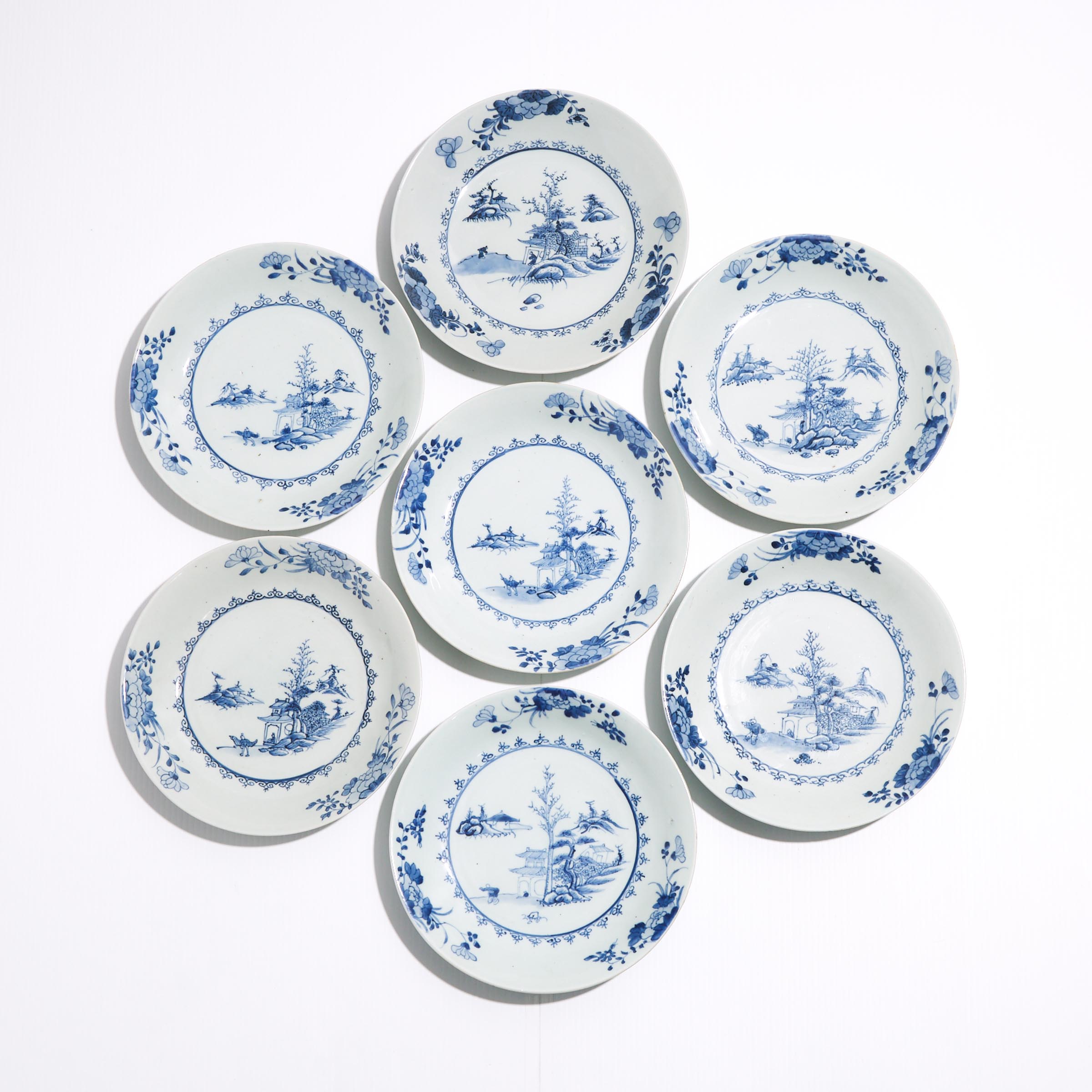 A Set of Seven 'Leaping Boy' Pattern Saucer Dishes from the Nanking Cargo, Qianlong Period, Circa 1750