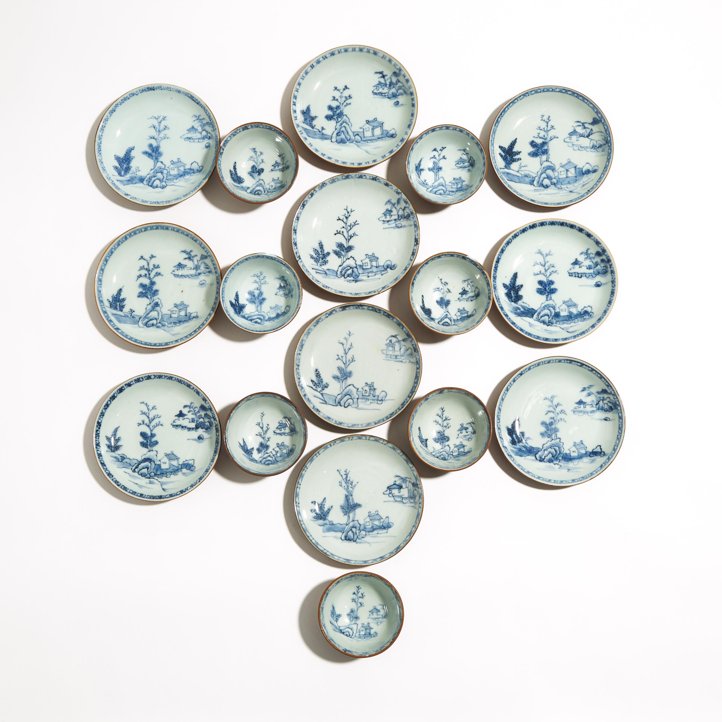 A Set of Seventeen 'Batavian Pavilion' Pattern Teabowls and Saucers from the Nanking Cargo, Qianlong Period, Circa 1750